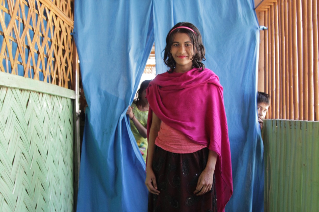 Assia from Rakhine, Myanmar, stands in a community safe space in Cox's Bazar run by the Bangladesh Red Crescent Society with support from the Danish Red Cross in January 2018.