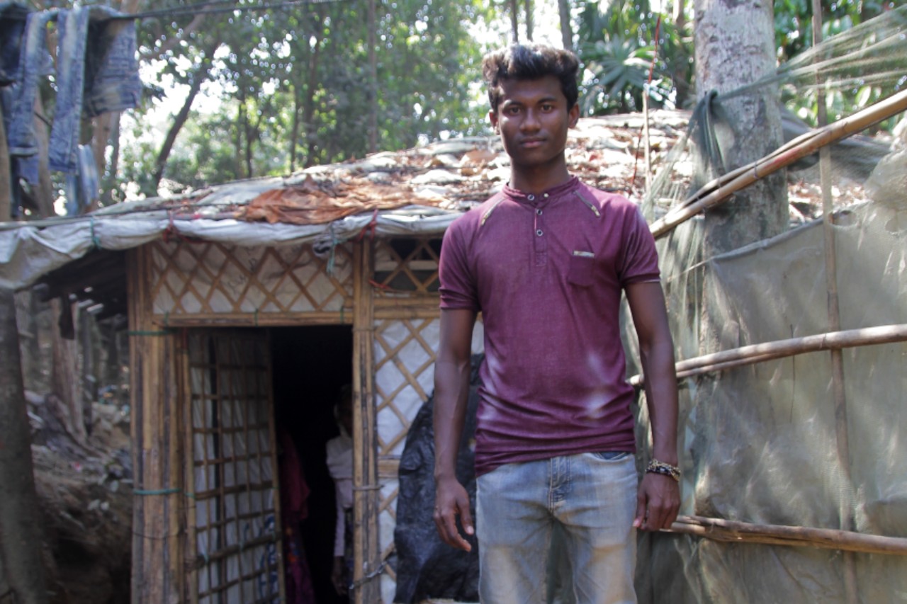 Tares, a 17 year old boy from Myanmar stands in Burmapara camp, Cox's Bazar in January 2018.