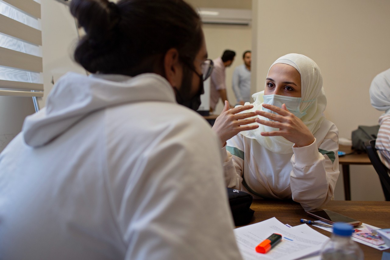 Alaa and Farouk, two participants of the ESSN storytelling project, take part in a communications skills workshop and talk in depth about their preferred methods of storytelling