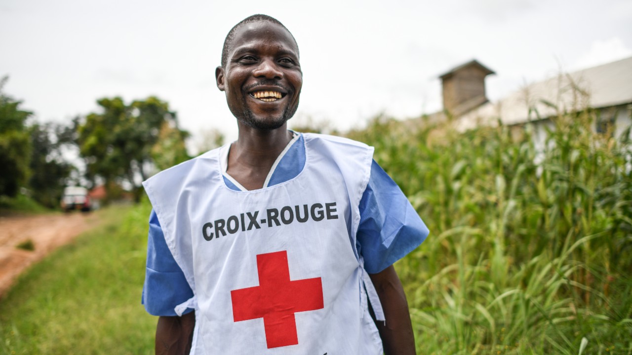 A health volunteer from the Democratic Republic of the Congo Red Cross smiles for a photo in Bunia, Ituri province.
