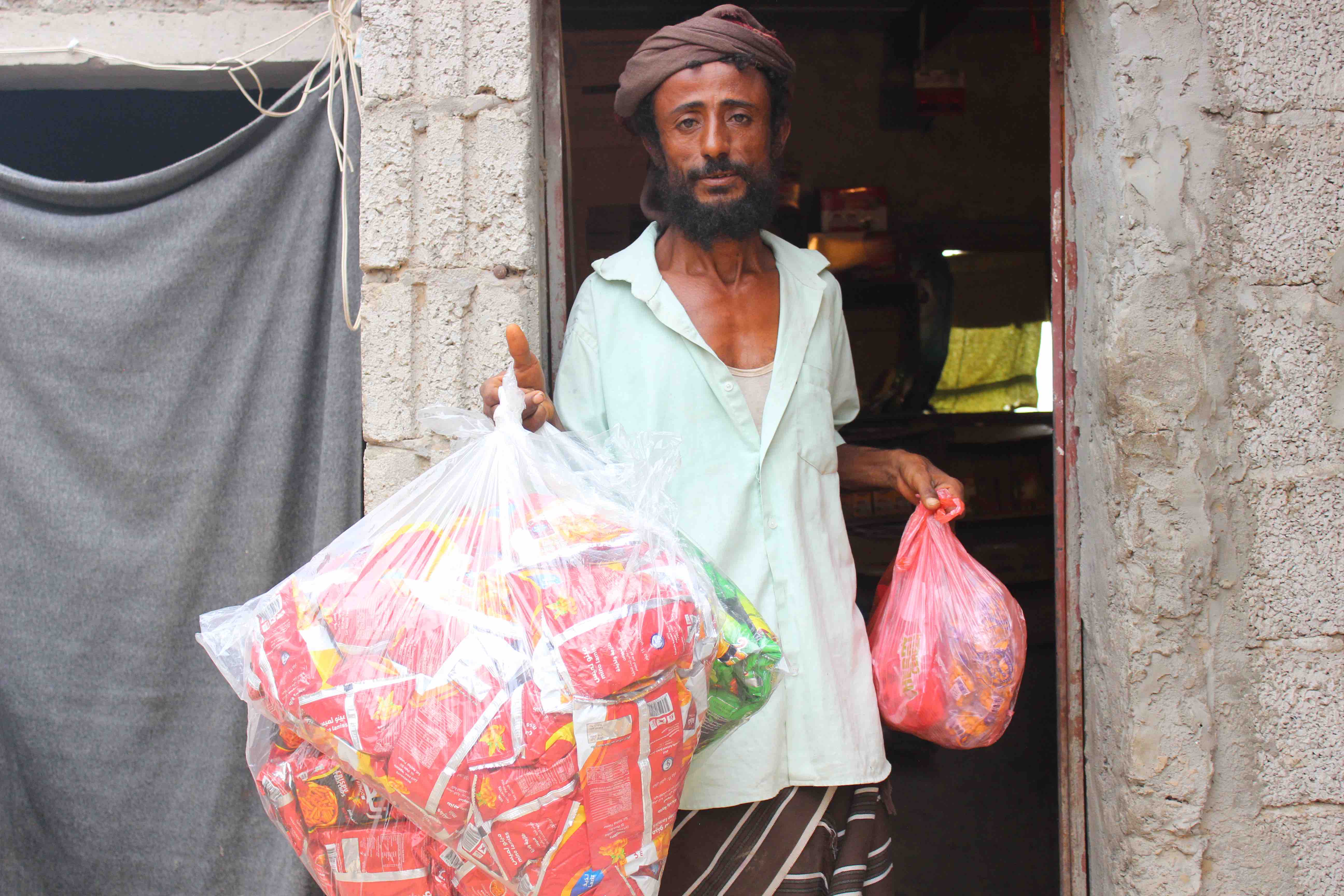 Cash assistance has allowed 39-year-old Ahmed to open a small grocery business and support his young family.
