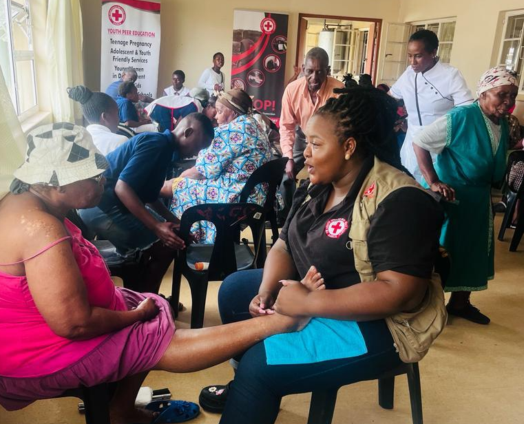A youth officer for the South African Red Cross, Hloniphile Zinya (right),  works with seven Red Cross branches to prevent HIV and gender-based violence in Kwa-Zulu Natal, South Africa.
