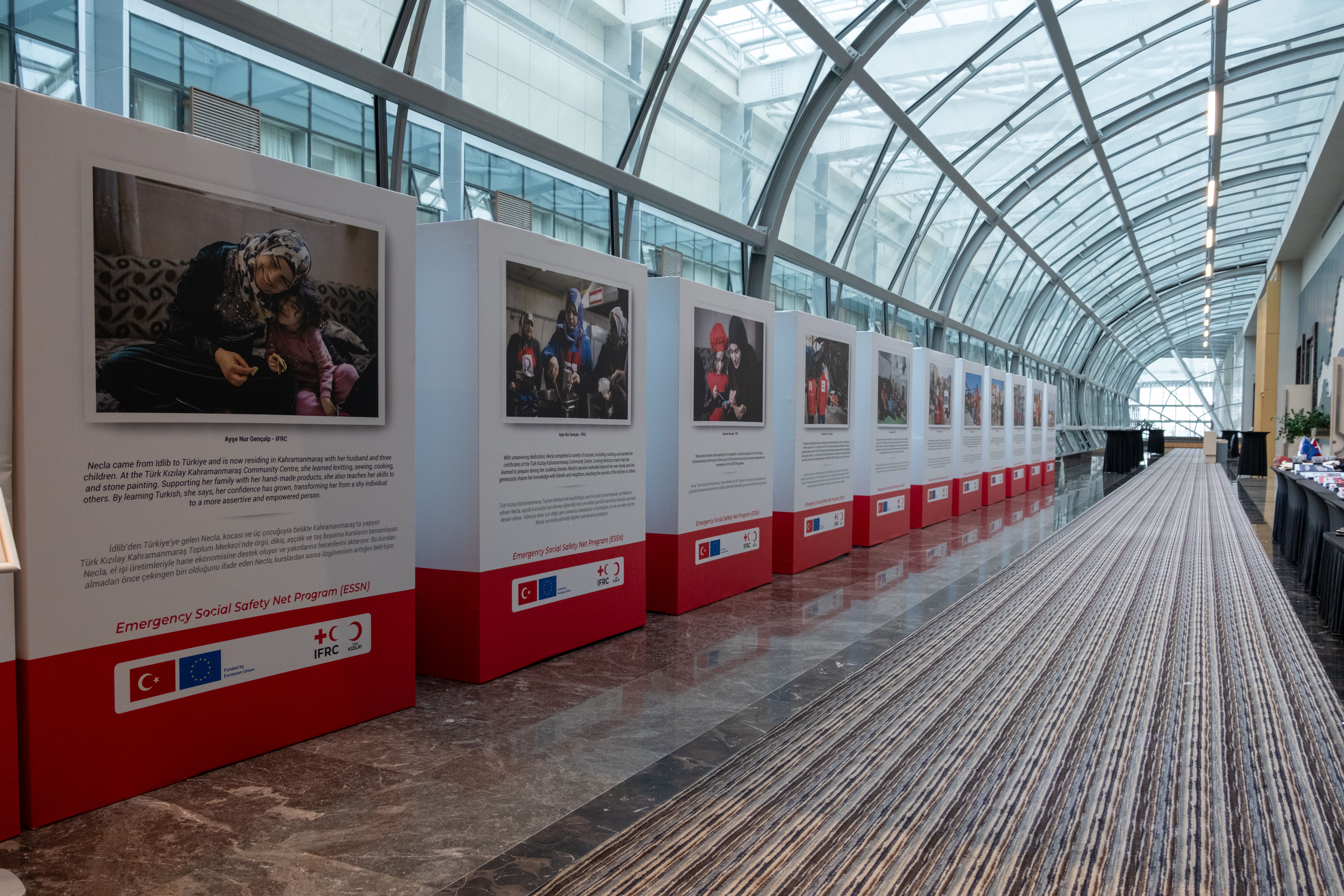 An exhibit in Ankara highlighting the positive impacts of ESSN for refugees from Syrian living in Türkiye and showcasing the collaboration between the IFRC, Türk Kızılay and the European Union.