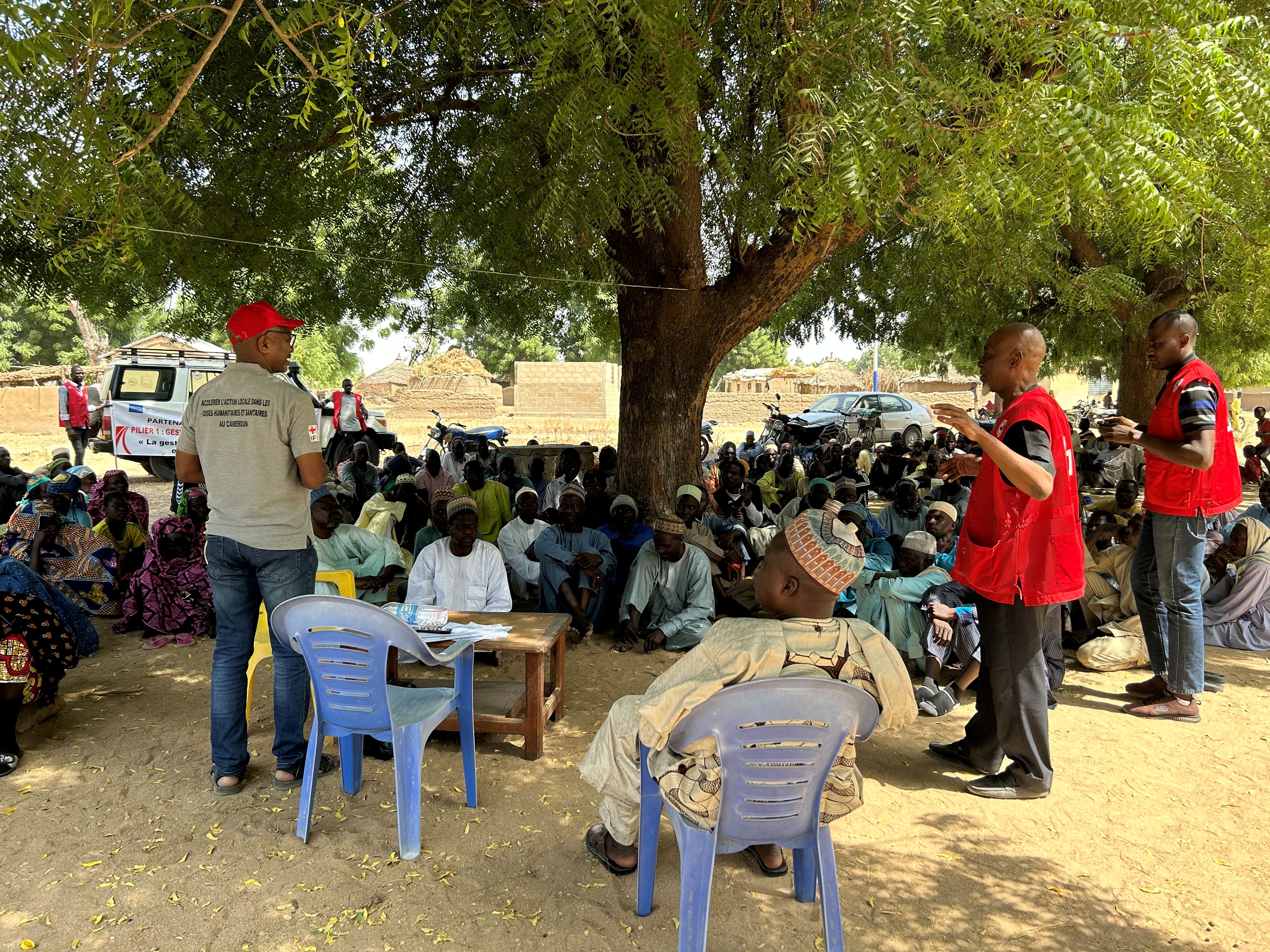 Prior to cash distributions, the Cameroon Red Cross explains more about the programme — and the donors and partners behind it — and offer advice on how best to use the money.