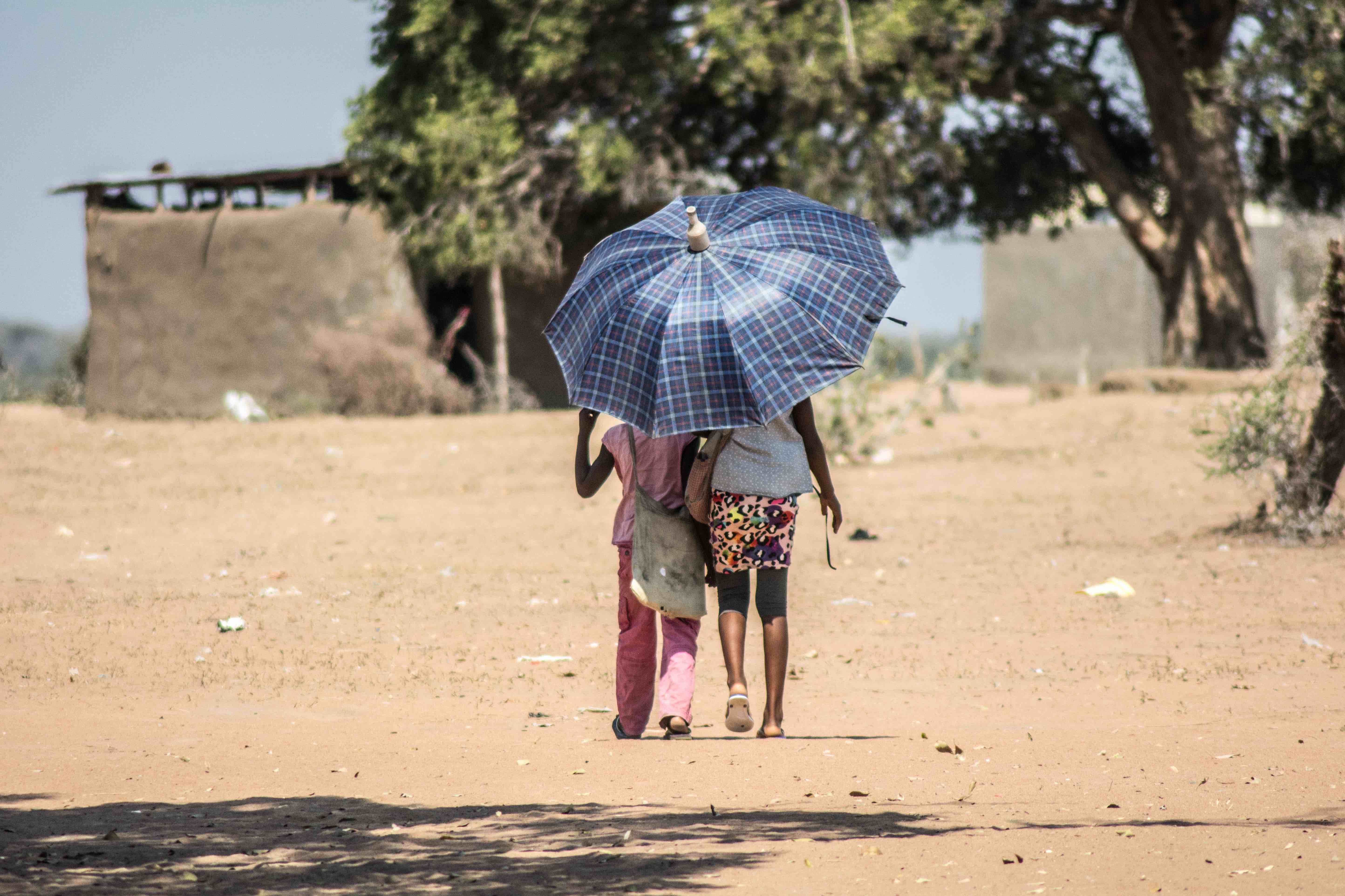 These two children, walking beneath a sun umbrella in a drought-affected part of Mozambique, offer an example of the solutions people often resort to in order protect themselves during extreme heat.  With heatwaves getting more frequent and intense, IFRC says more must be done to help people adapt.