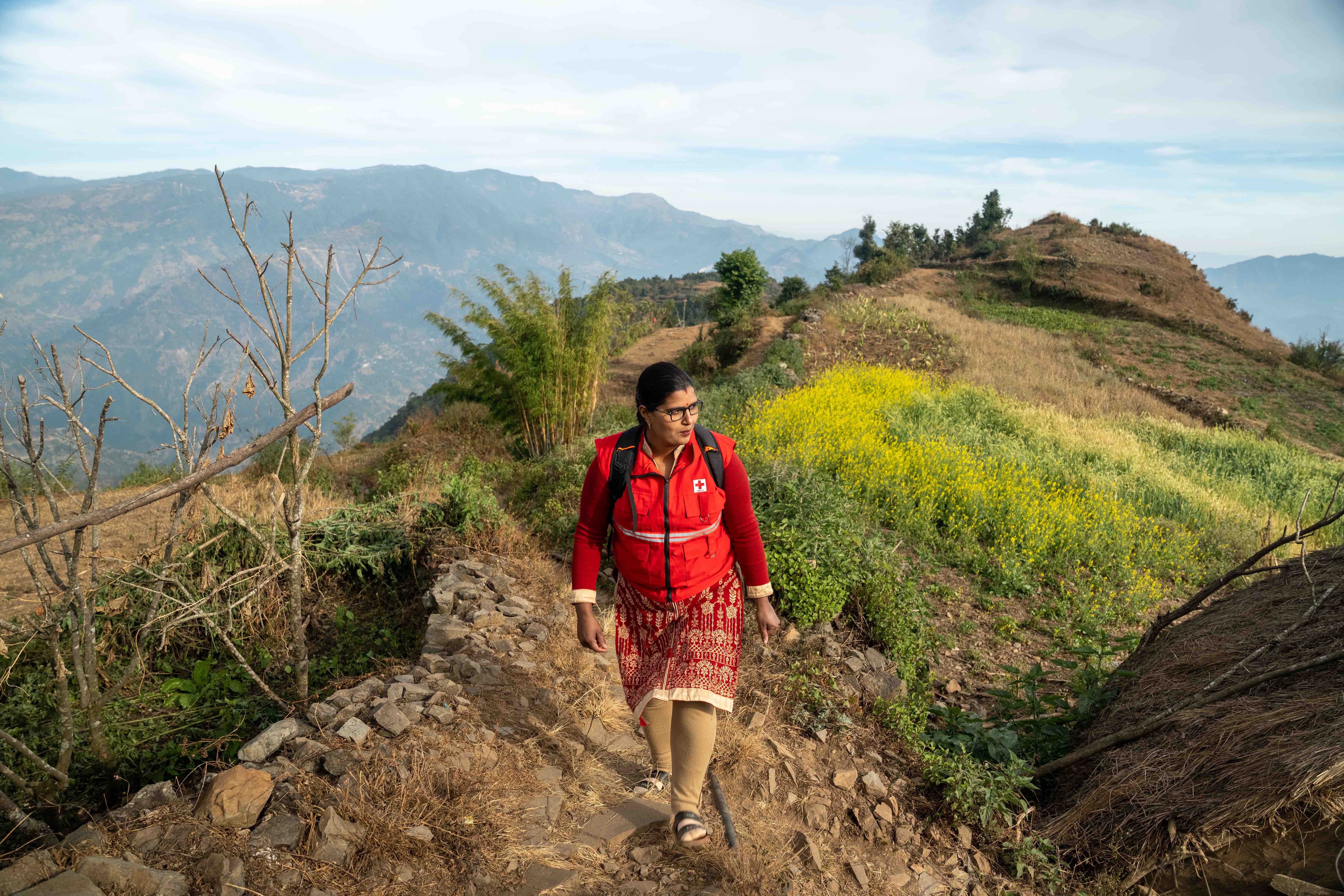 For more than two years, Nepal Red Cross volunteer Muna has been hiking up steep mountain trails to meet with women who promote good hygiene, sanitation and healthy water use in their communities.