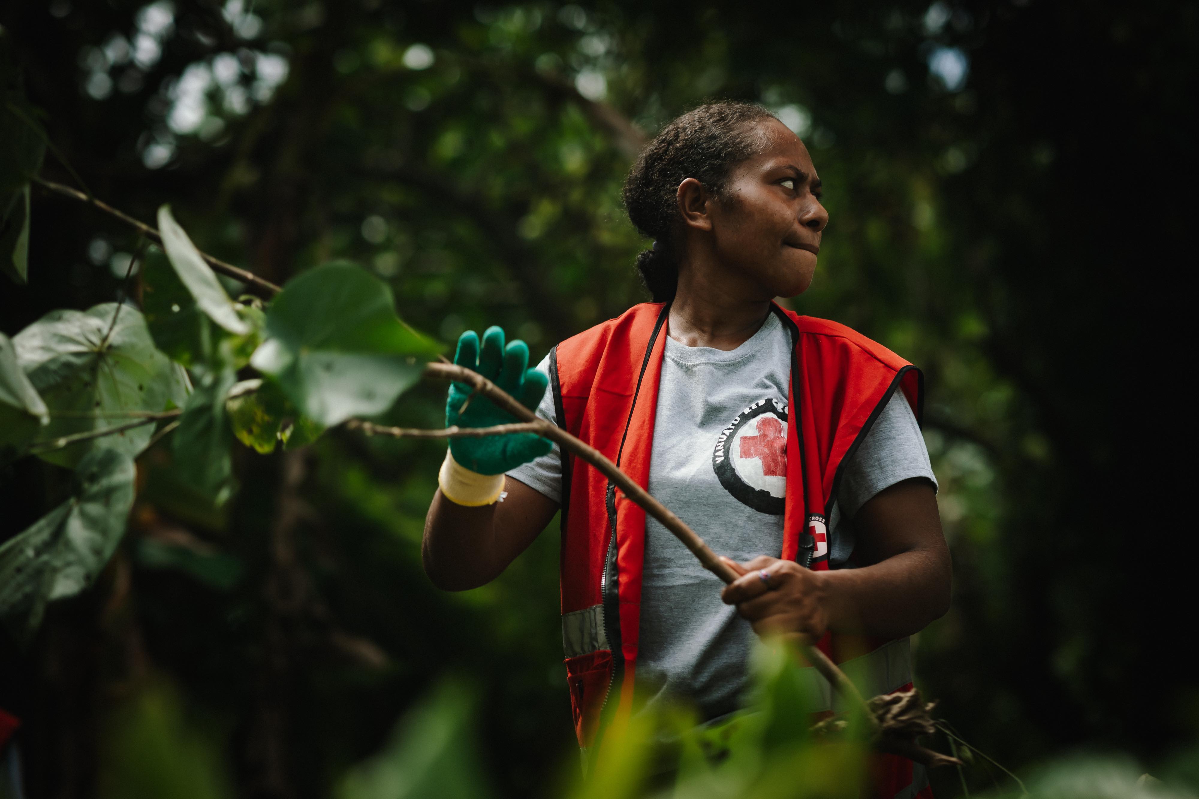 Tiffanie Boihilan, 27, is one of the Red Cross volunteers who helped with the riverbed clean up, which aims to ensure that debris and vegetation in the riverbed doesn’t block water flow and cause flooding in the nearby village of Solwe.