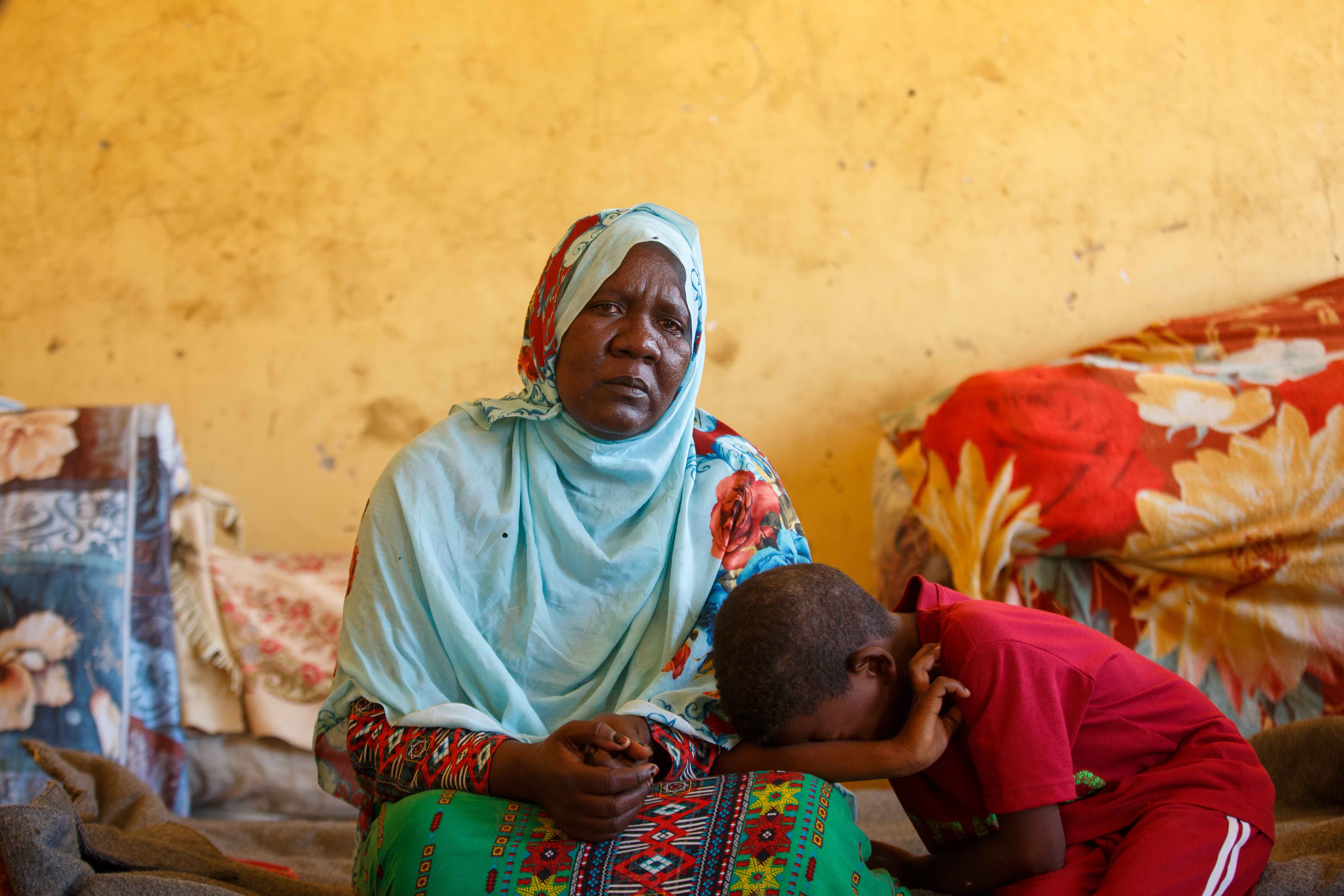 Antasar Jouma Adam and her son have been forced to flee their home and found refuge in Port Sudan, Sudan.
