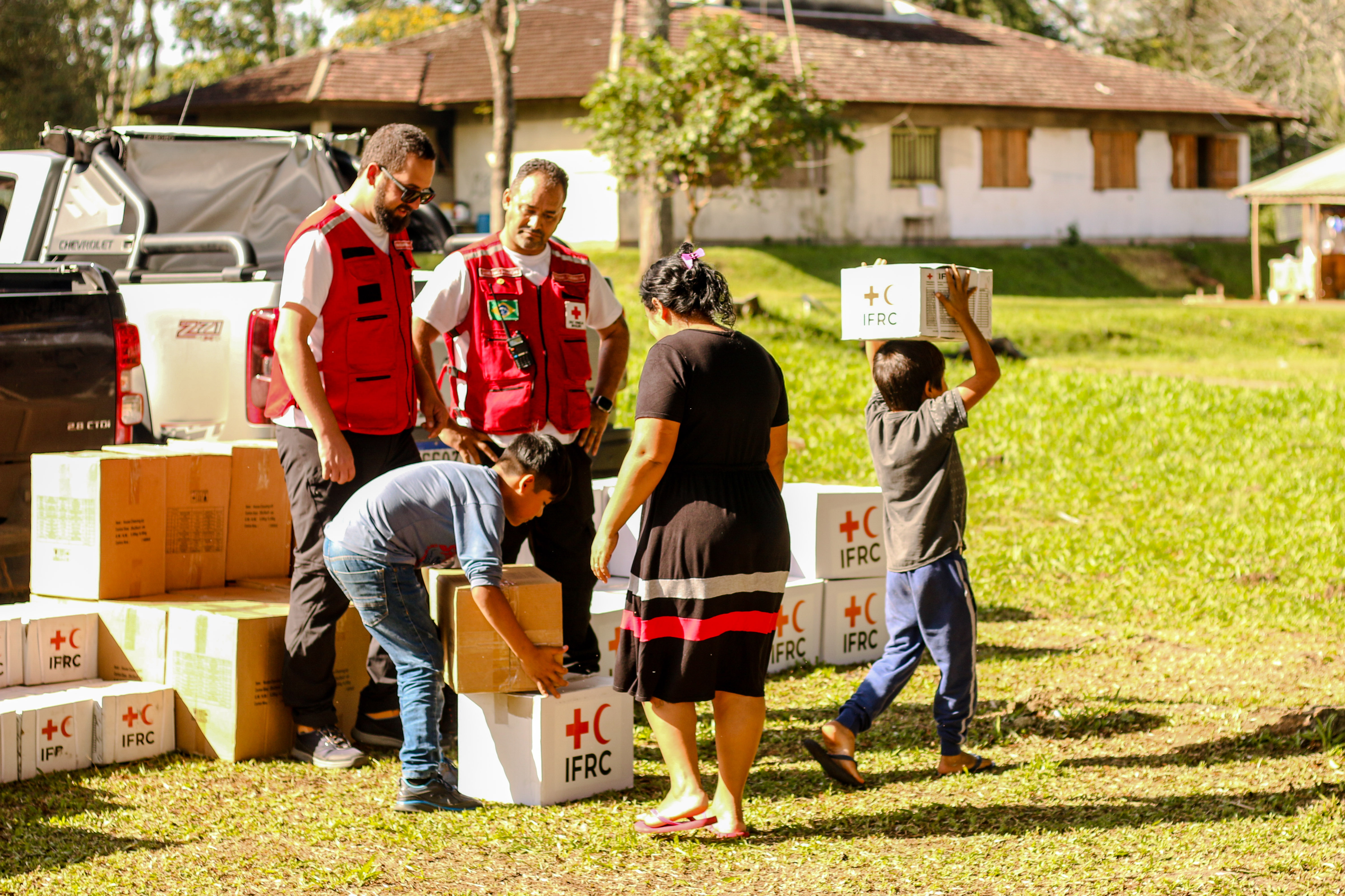 Brazilian Red Cross volunteers deliver boxes of relief items to the indigenous community of Goj Kusug in Rio Grande do Sul, Brazil, a community that indirectly affected by the floods.  