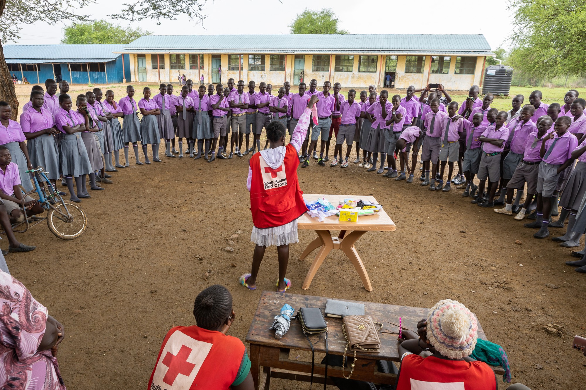  In the courtyard of a local school, South Sudan Red Cross volunteer Esther Sevilla stands before several dozen students, holds up a sanitary pad and asks ‘Do you know what this is?’  
