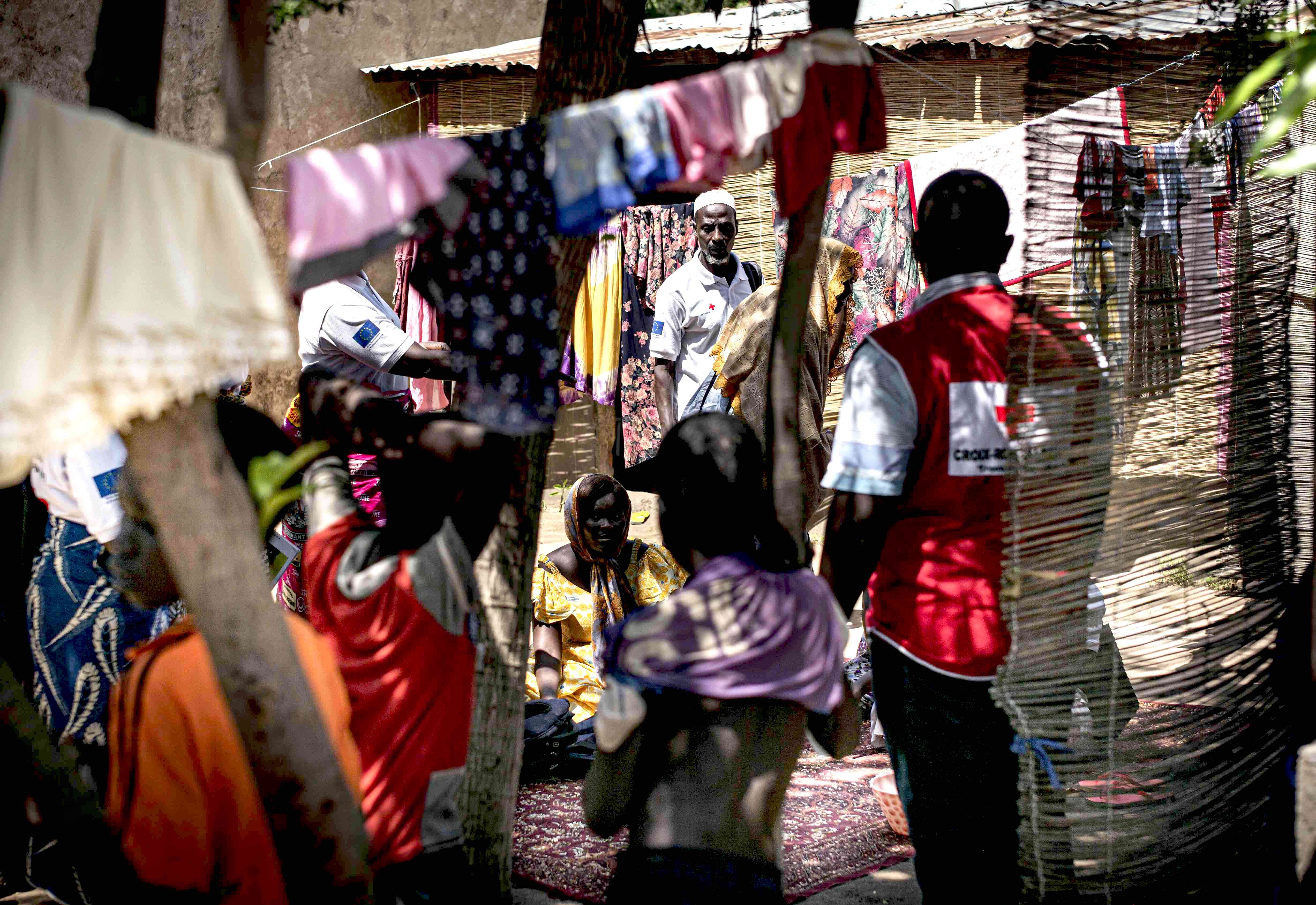Volunteers with the Chad Red Cross go door to door in Bongor, Chad to raise awareness about how to prevent infectious diseases.