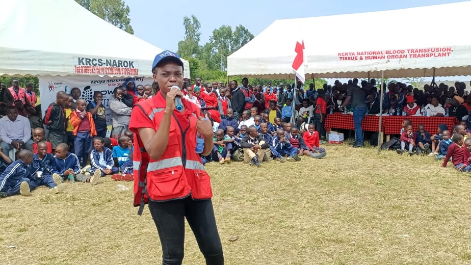 Celestine Ogutu from Kenya Red Cross kicks off the Chanuka Challenge event in Narok County.