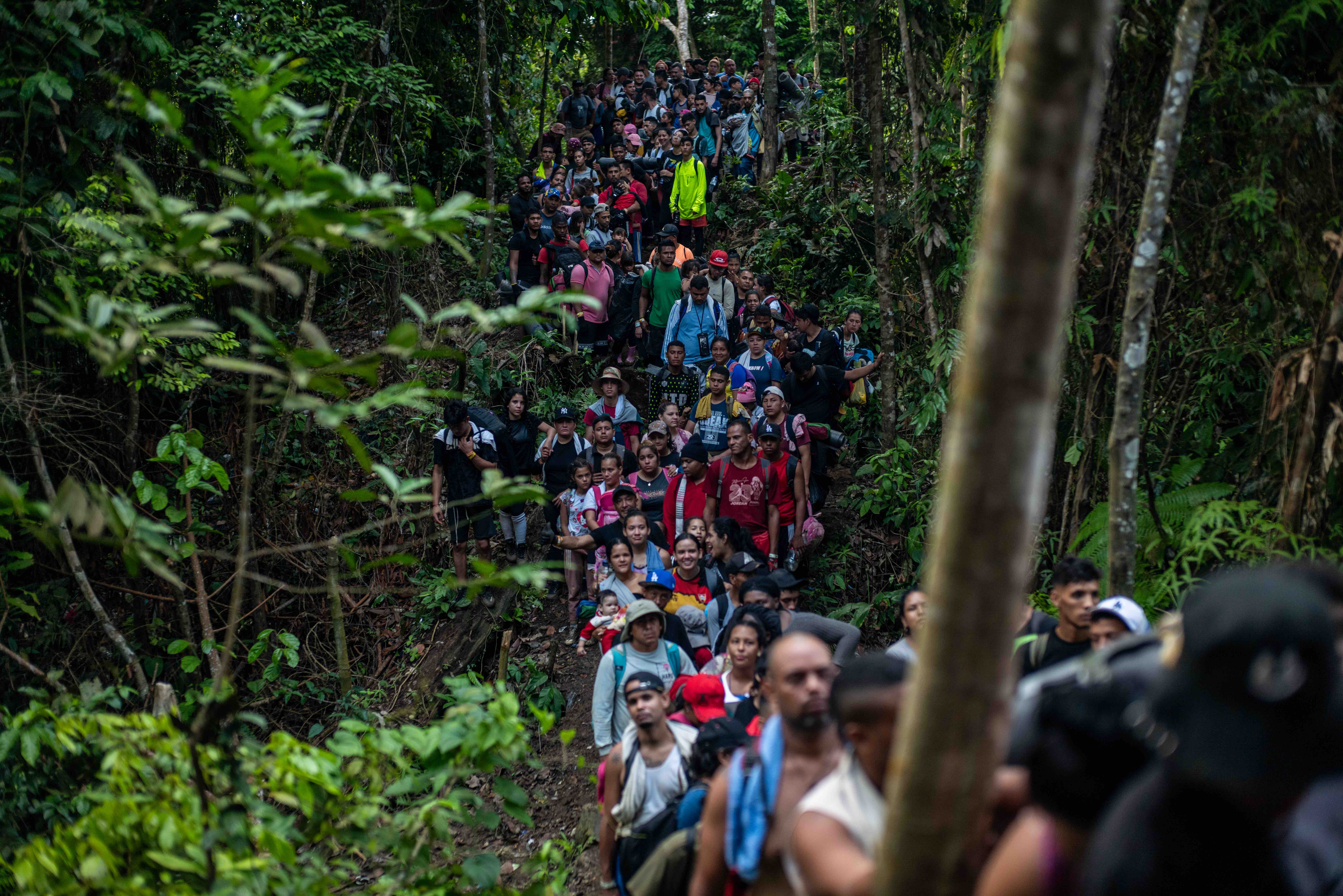 Scenes like this one – large groups of people caught in what looks like a human traffic jam – are common at crossing points such as the one at Banderas Hill, near the border between Colombia and Panama. 