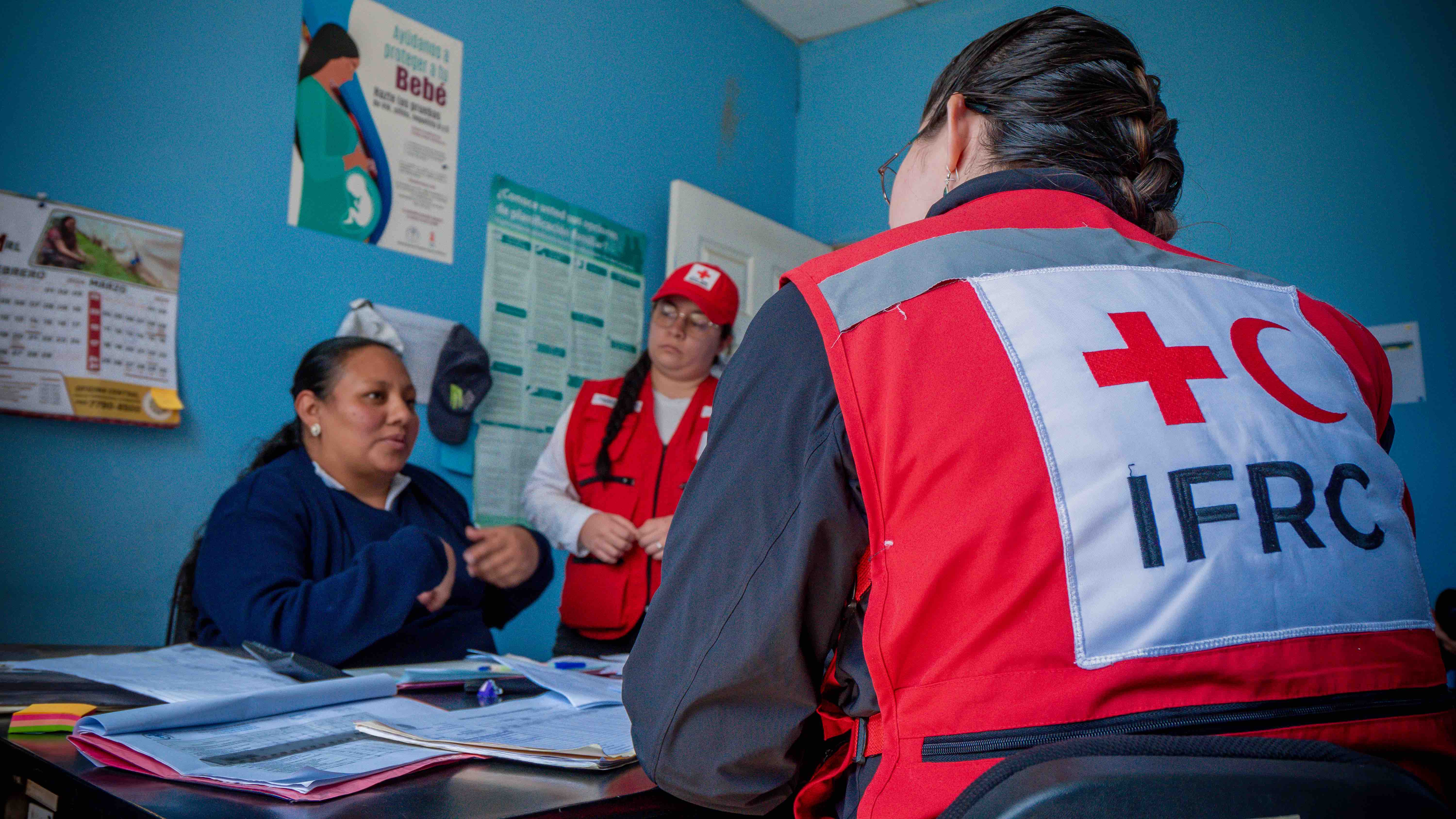 IFRC staff meeting with Guatemalan Red Cross as part of a project aimed at improving local health services.