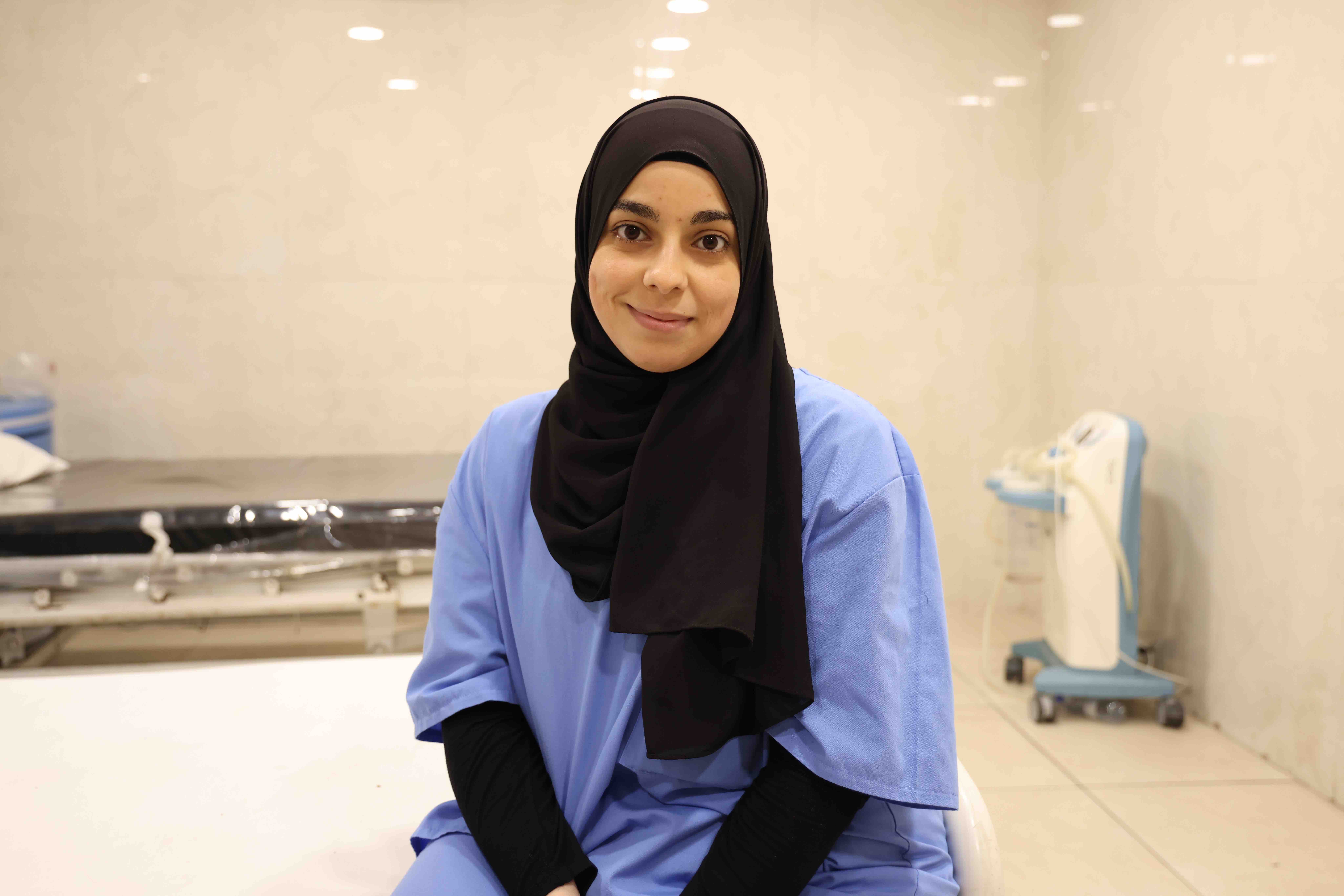 22-year-old Saja volunteers at Al-Hamshari hospital and is studying to become a nurse.