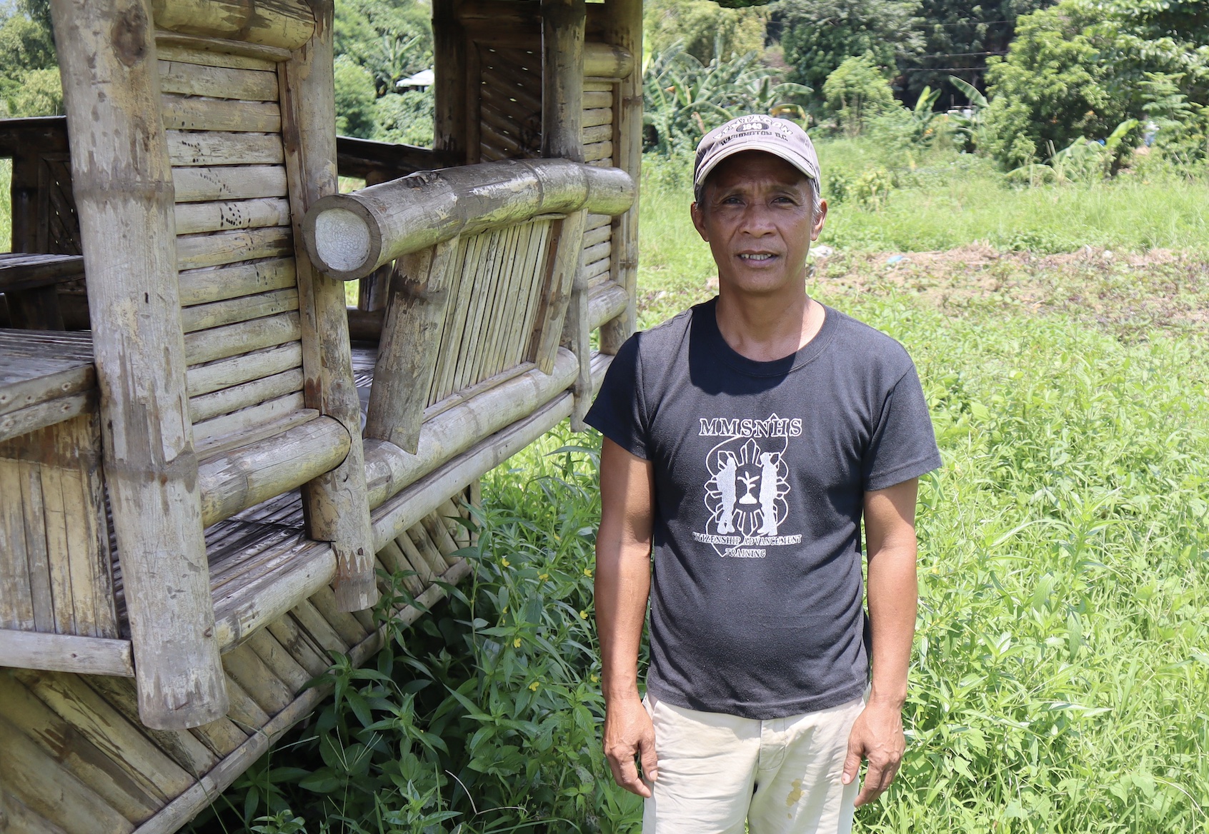 Edgardo Sibbaluca, a construction worker in Rizal, a province in Central Luzon, stands outside his home. His family of six experienced the full force of Super Typhoon Carina that hit the Philippines in July this year.