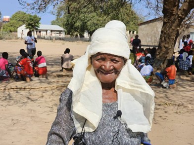 Ninety-year-old Musambo Sianjonkoma, unable to seek food on her own, is one of the recipients of the cash support programme. 