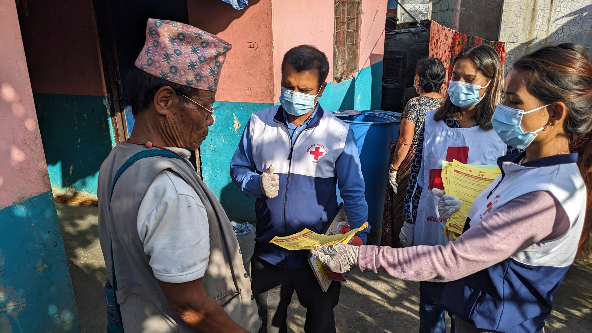 Nepal Red Cross volunteers engage community members in Pokhara in dengue fever prevention activities, sharing valuable information on environmental cleanliness to eliminate mosquito breeding grounds and personal protective measures so families can stay safe. 