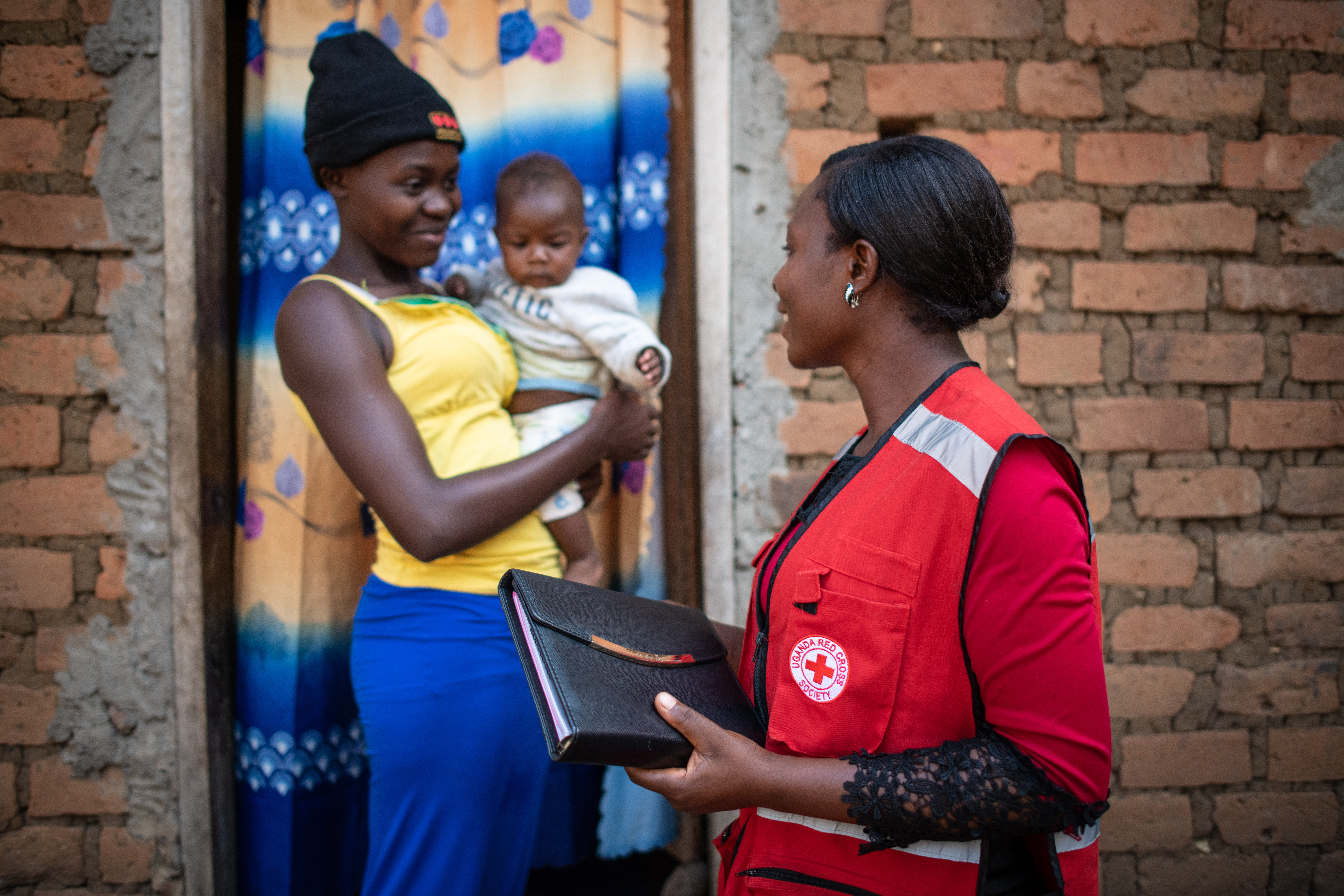 Karungi Shamillah is a Uganda Red Cross volunteer trained to educate families about Ebola and other health issues in her community.