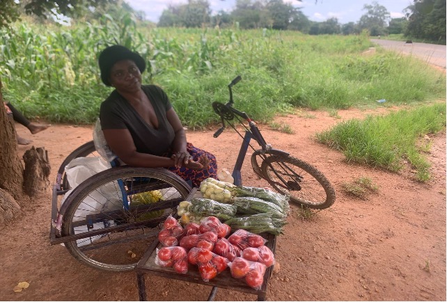 In addition to her volunteer work, Patricia works to provide for her family by selling vegetables along the side of a local road. 