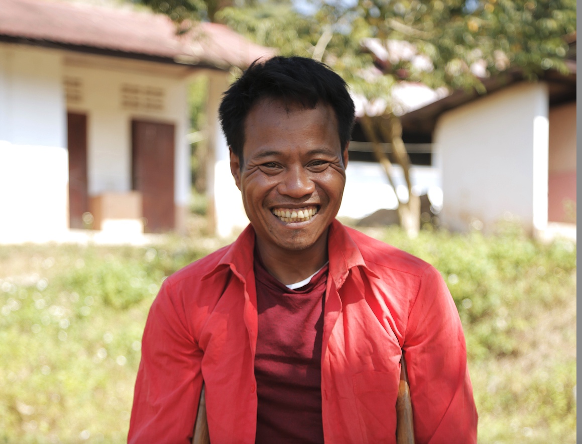 Thonglien after receiving cash assistance for his family from Lao Red Cross and the IFRC’s Disaster Response Emergency Fund. 
