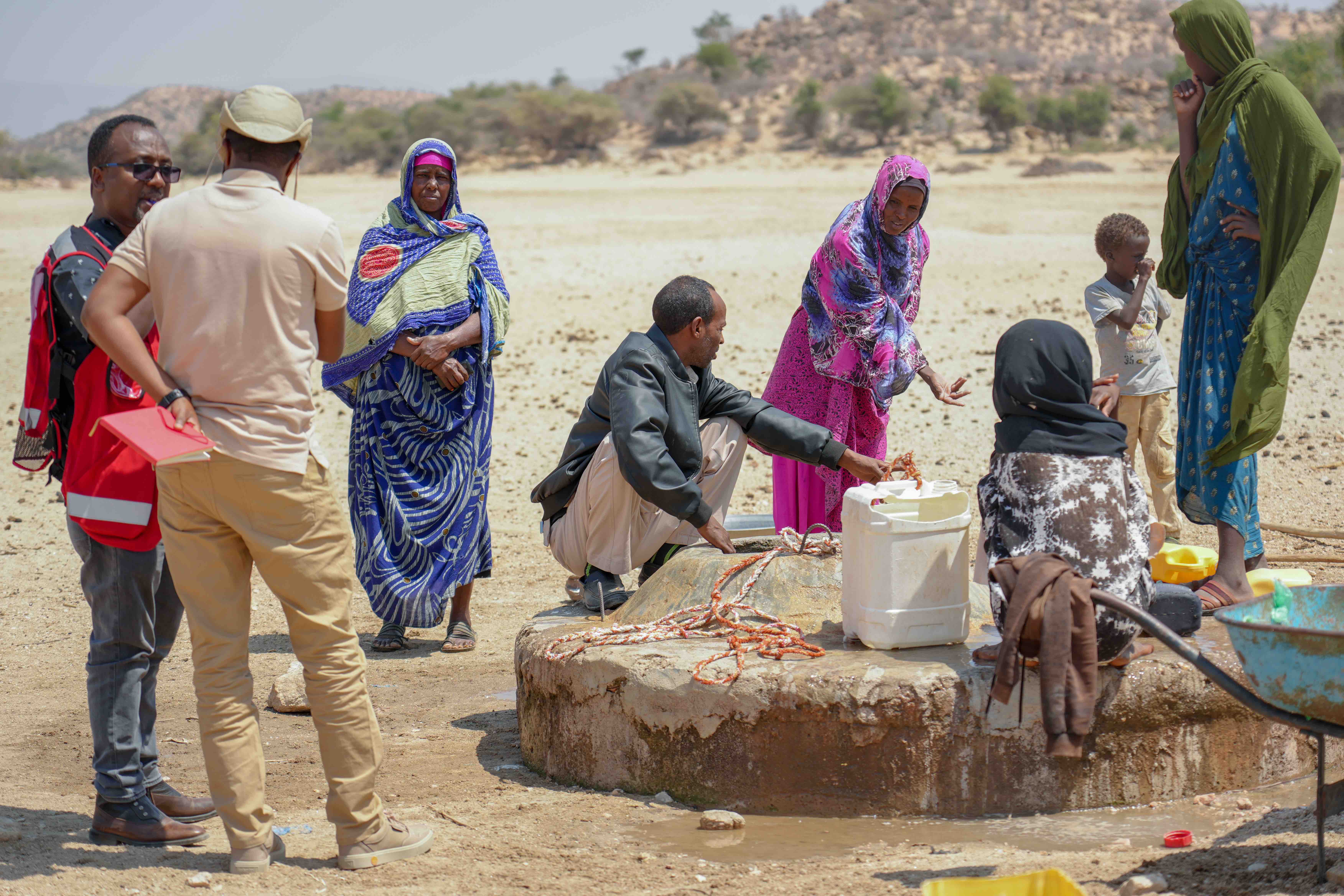 Families gather at the last remaining shallow well in Il-Hagar village that serves as the sole water source for over 300 families.The community has reported a steady decline in water levels, raising concerns about how long the well will meet their daily needs.