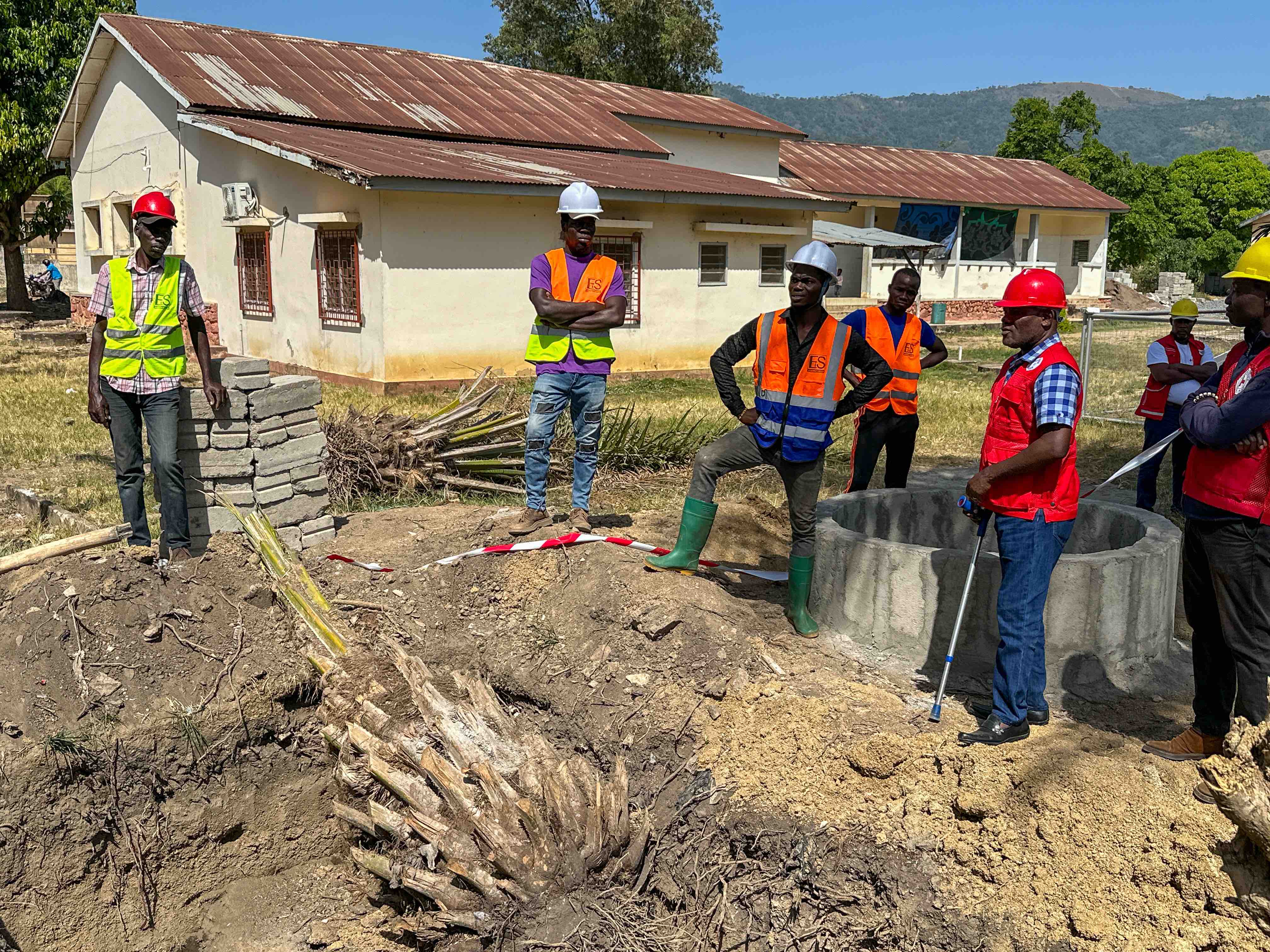  A team of workers from the Togolese Red Cross work on building a series of new latrines in a rural prefecture in Togo where people lacked sufficient sanitation and water services.