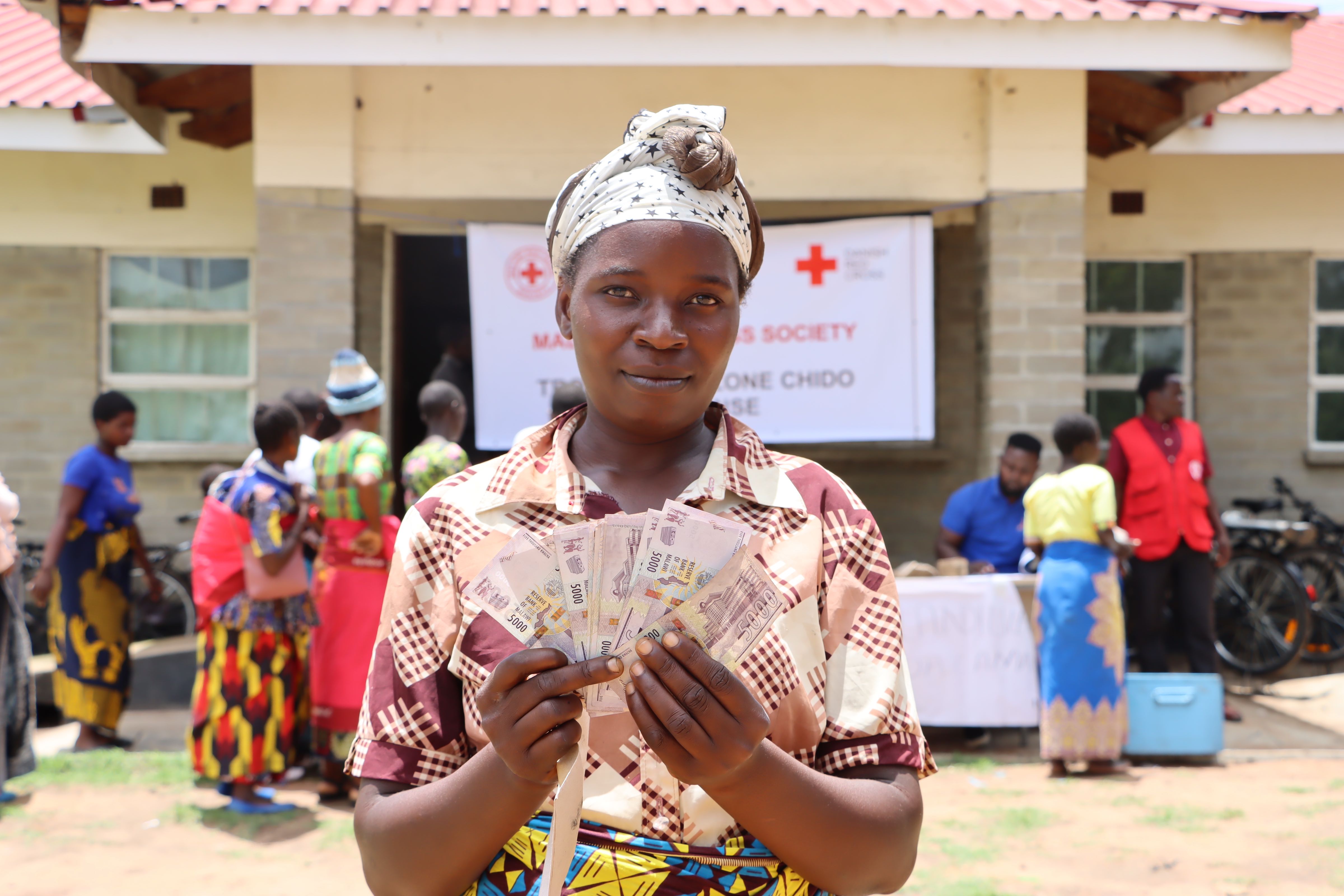 With the cash assistance provided by the IFRC and Malawi Red Cross, Mary Mangazuwa will rebuild her home in Misomali village, Malawi.