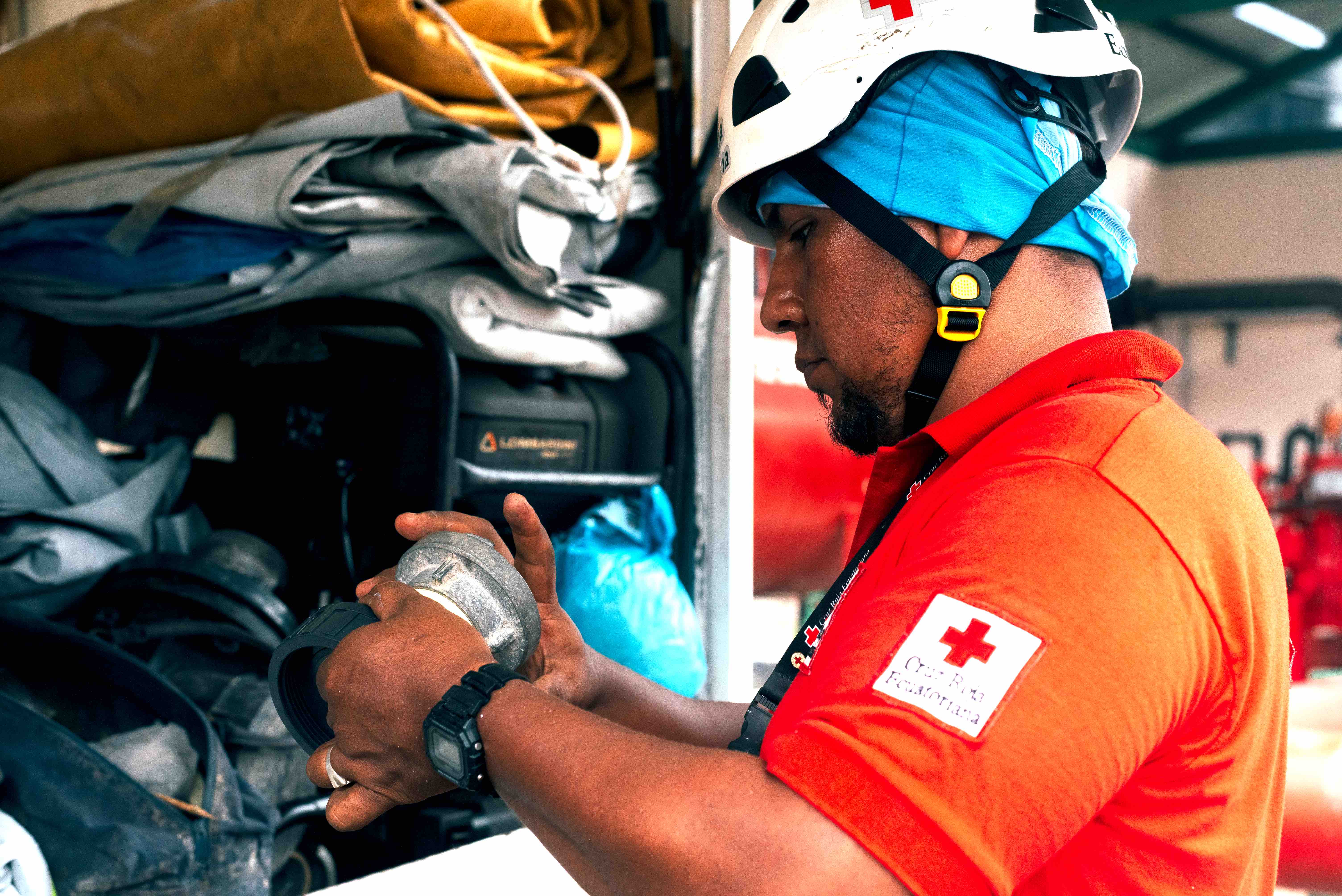 A technician from the Ecuadorian Red Cross works at the water treatment plant to supply the communities affected by the oil spill in Esmeraldas.