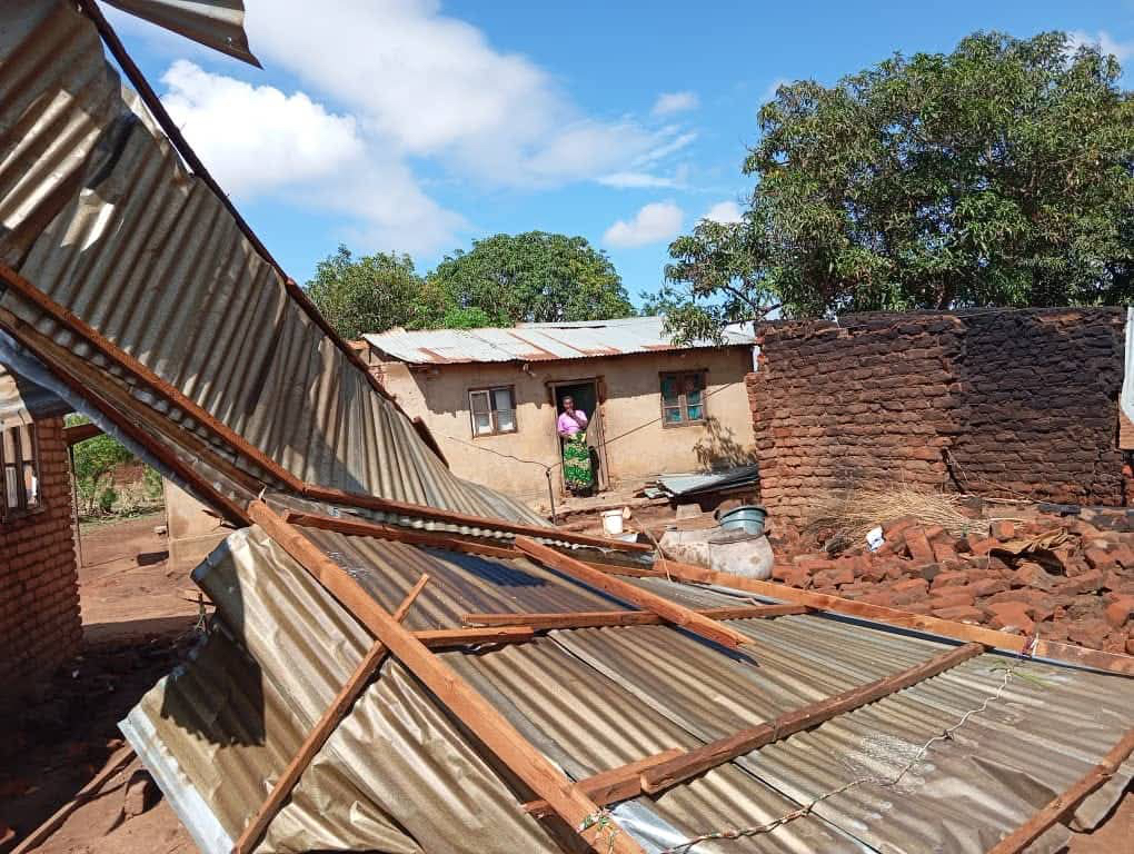 A woman stands silently, gazing at the ruins of her neighbour’s home after Tropical Cyclone Chido unleashed unprecedented winds across Malawi. The cyclone displaced thousands, devastating livelihoods. 