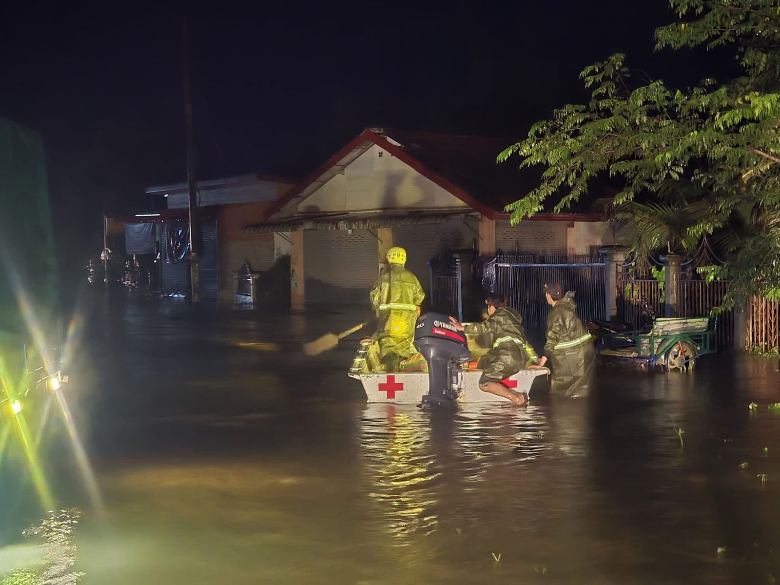 As climate emergencies, like this one in Lao PDR in 2025, become more frequent and severe, community knowledge of basic first aid is increasingly important. Here the Lao Red Cross navigates a flooded village looking for survivors to evacuate.