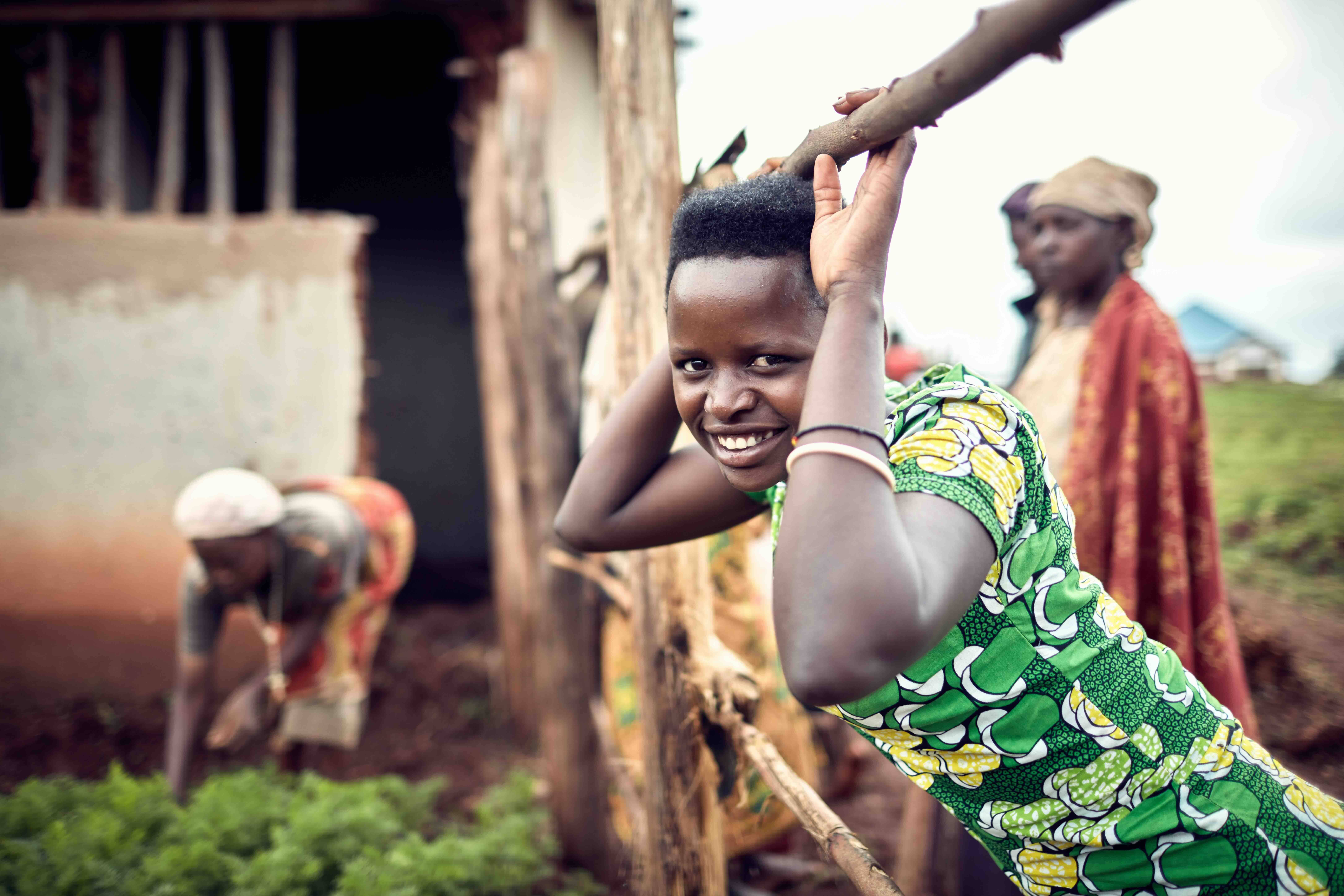 Rural residents tend to a community garden supported by the Rwanda Red Cross as part of its ongoing food security efforts. 