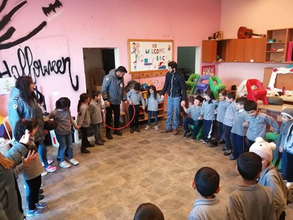 Lebanese Red Cross youth volunteers engaging children in the kind of activities that have inspired generations of young community members. 