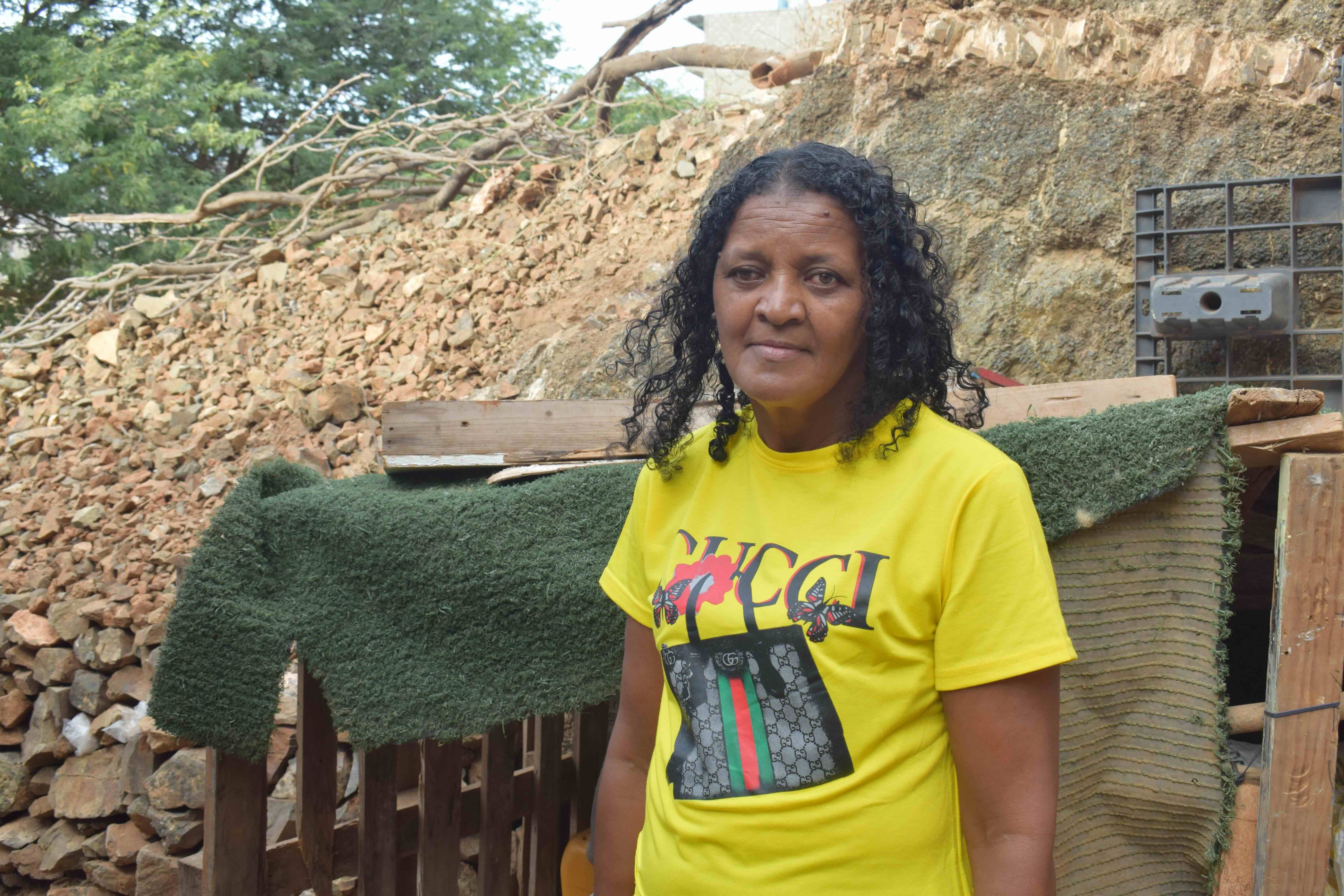 Like thousands of families, Vera Lucia Andrade, a street vendor and mother of six, lost almost everything during the flood. Here, she stands in front of her badly damaged home.