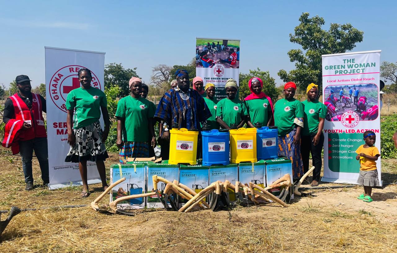 Members of The Green Woman project stand in front of their farming tools and supplies. Implemented by the Ghana Red Cross Society, the project was funded by the Empress Shoken Fund in 2025.