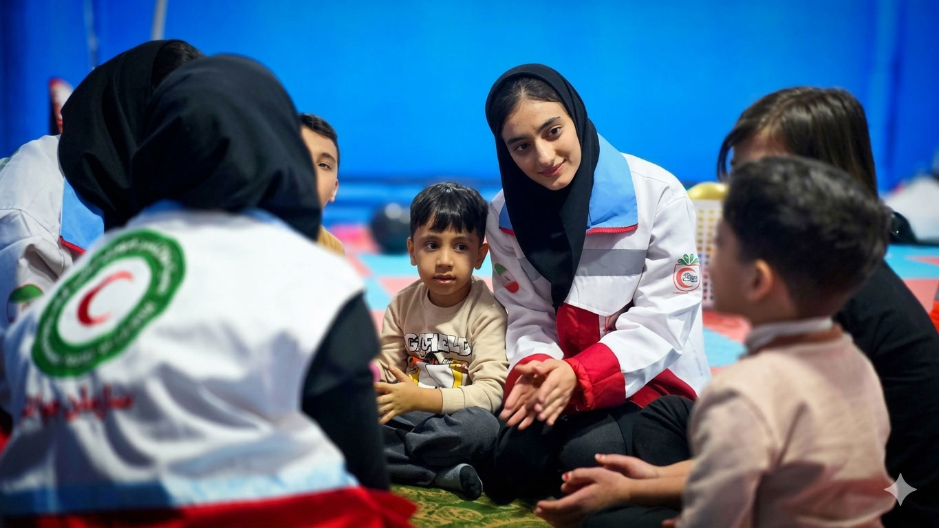 Iranian Red Crescent psychosocial support teams spend time with children in emergency shelters, offering comfort and a sense of normalcy during the ongoing hostilities.