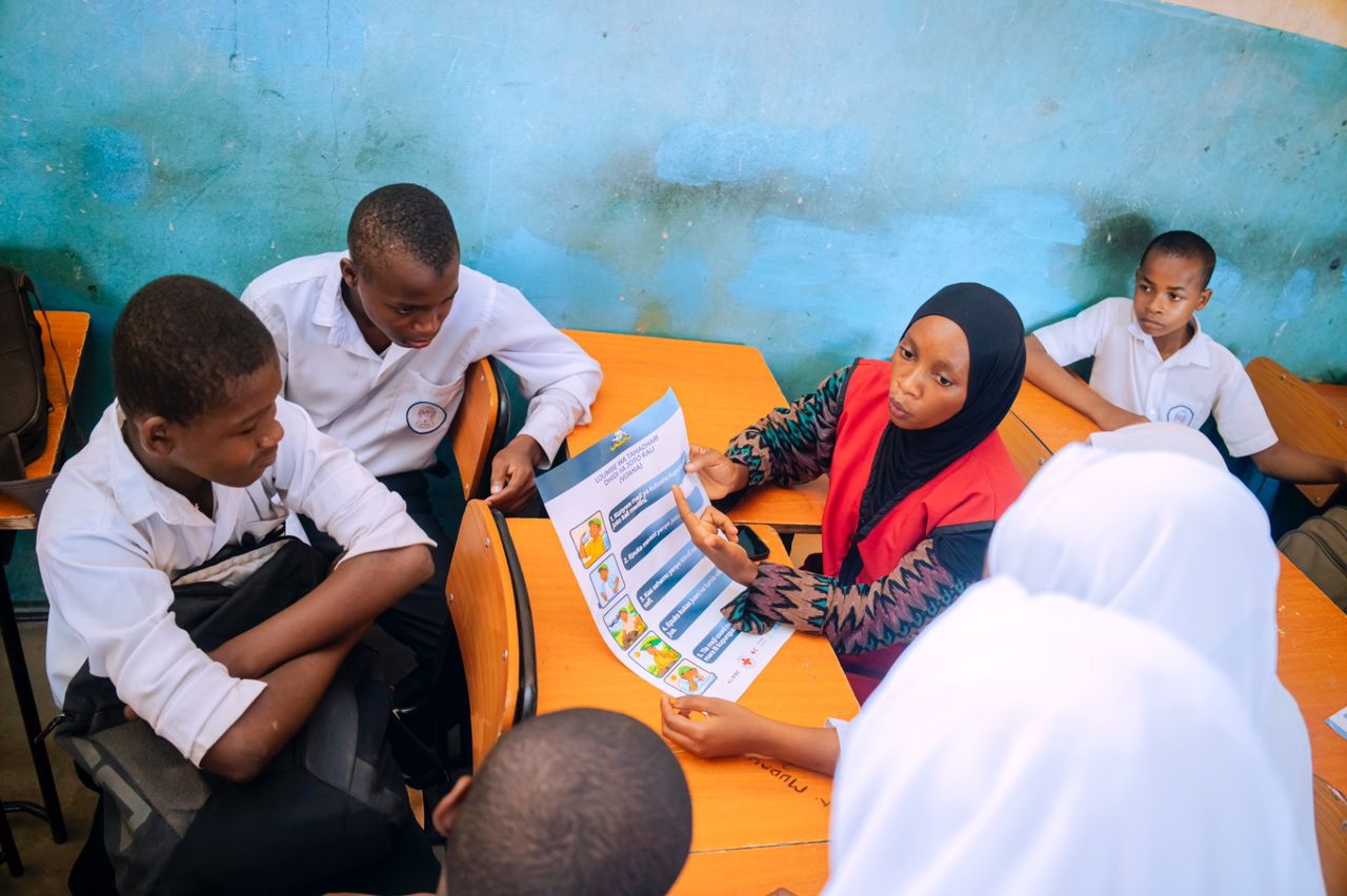 Tanzania Red Cross Society staff and volunteers in Unguja Island reached more than 4,000 people in schools, madrasa, markets, and communities during a heatwave awareness campaign in 2026.
