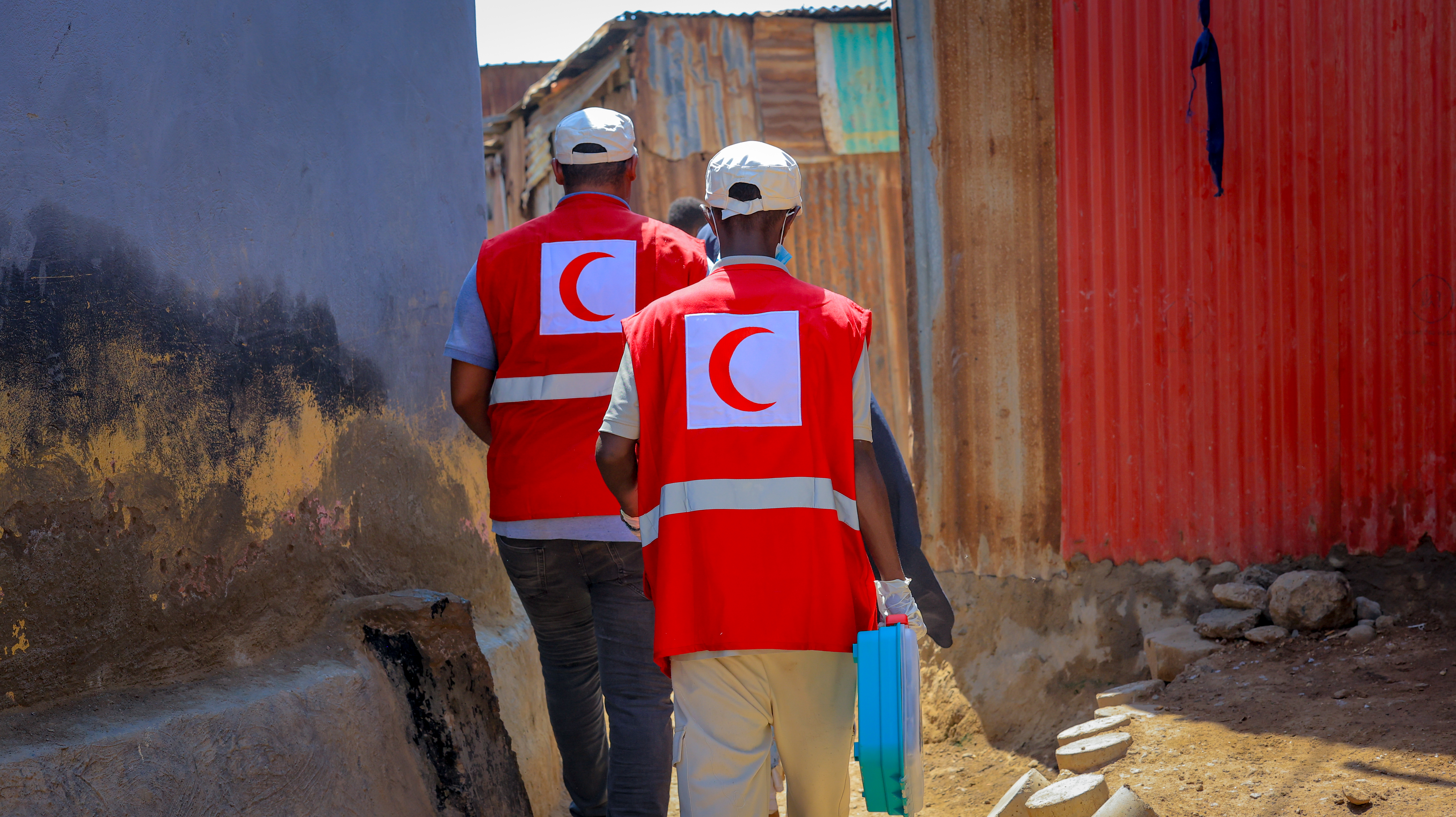 Two Djibouti Red Crescent volunteers on their way to provide support to people migrating through a section of the country with little water, food and other services.