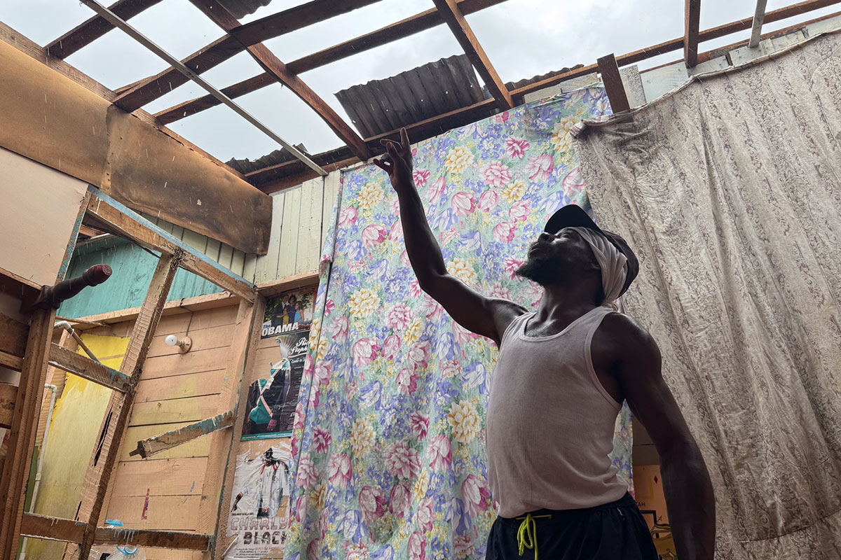 Hurricane Melissa survivor Dwayne Francis recounts how he and his neighbour fought together for survival as Category 5 winds tore through their community and homes in Jamaica in November 2025.
