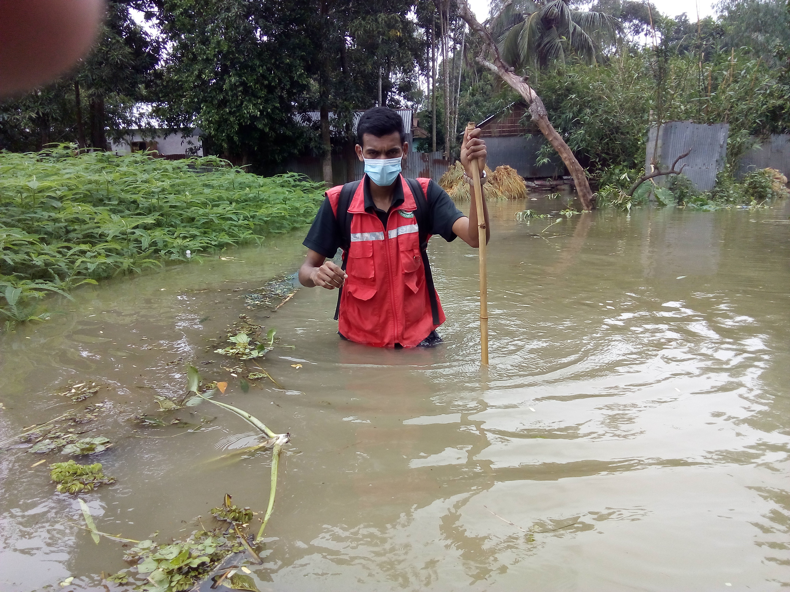 Jamalpur, Bangladesh, June 2020: Bangladesh Red Crescent Society teams providing unconditional cash grants to those affected based on flood forecast. In Jamalpur, more than 4,300 people received cash 
