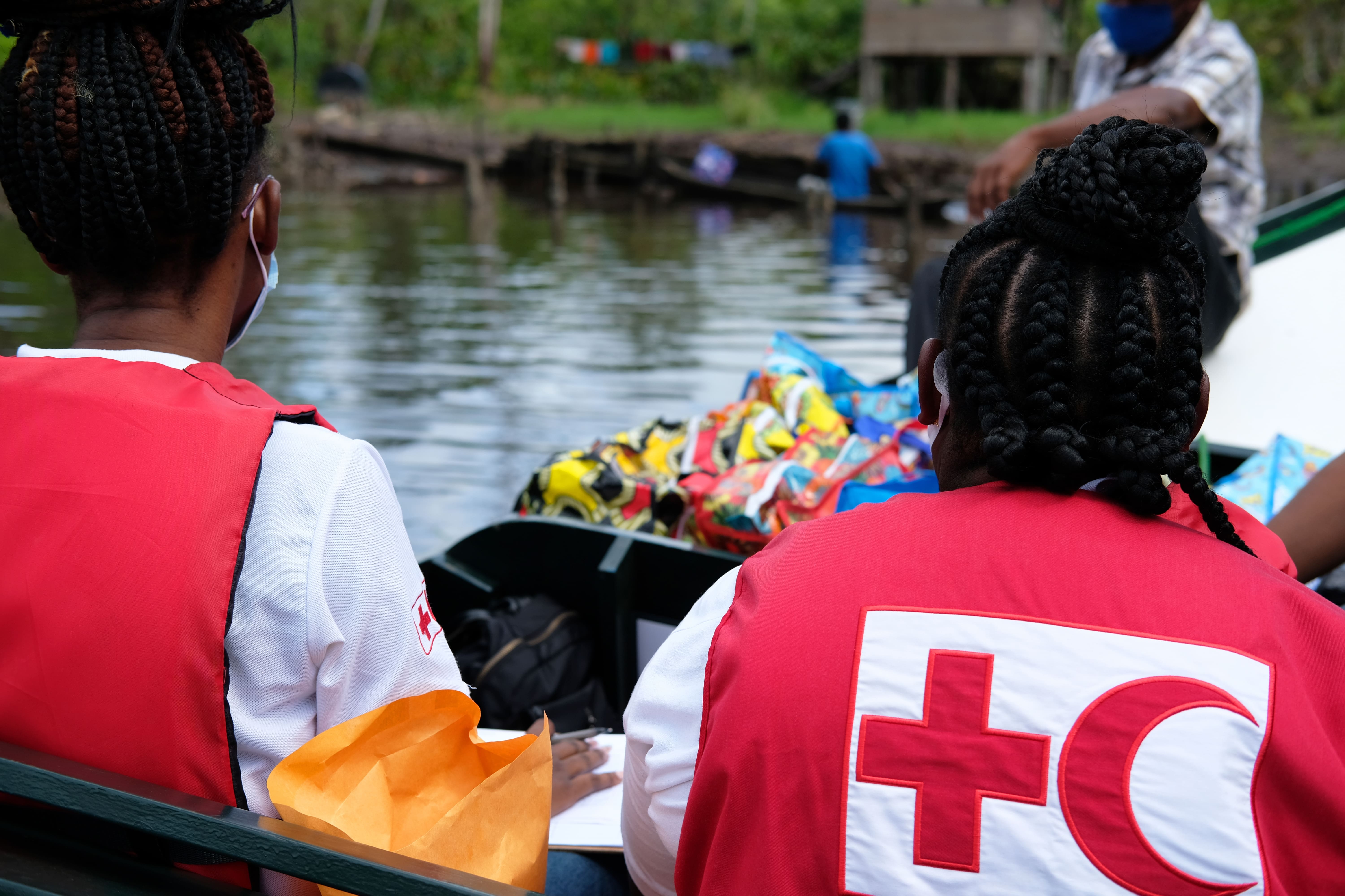 The Guyana Red Cross team delivers hygiene kits to communities living on the river near Mabaruma, Guyana.