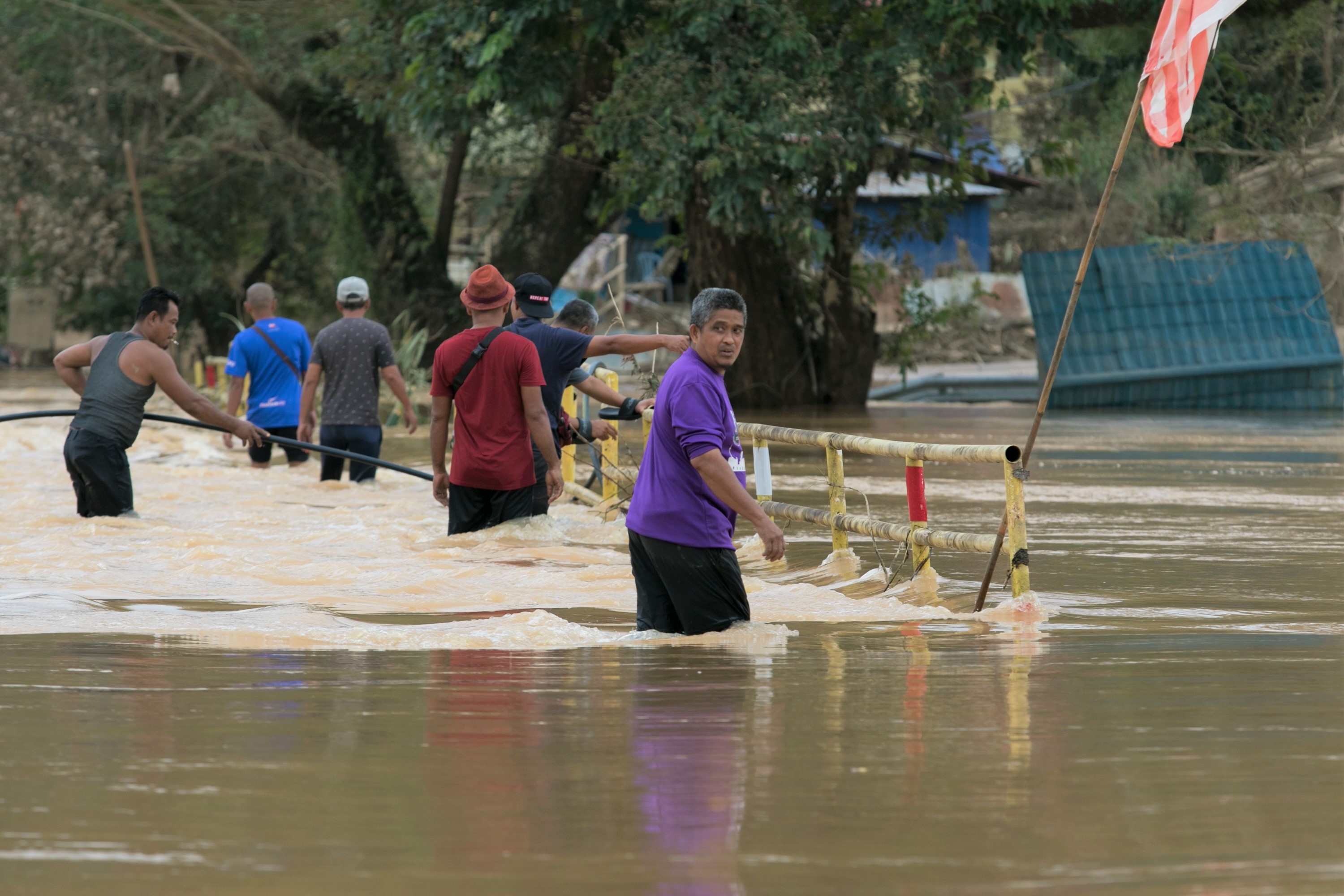Raging floods hit several towns in the states of Terengganu, Pahang, and Johor in Malaysia, causing authorities to issue an emergency alert and evacuated more than 50,000 people.Malaysian Red Crescent