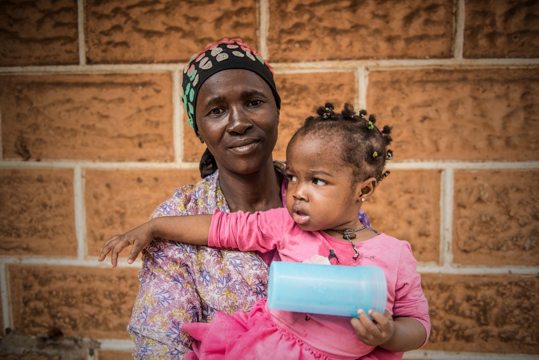 Aminatta Grant, Ebola survivor, Sierra LeoneLots of people used to depend on our family. Now they won't even touch food from the quarantine house. They shun us, they call us 'Ebola'. We can't even go 