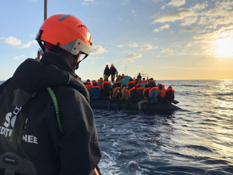 An Ocean Viking crew member aboard the fast-moving rescue boats that are sent from the main vessel to meet with boats in distress.