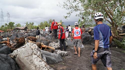 Philippines Red Cross volunteers conduct damage and needs assessments, provide first aid and psychosocial support and restore family links to people affected by a dyke collapse caused by torrential rains brought by Super Typhoon Goni in November 2020
