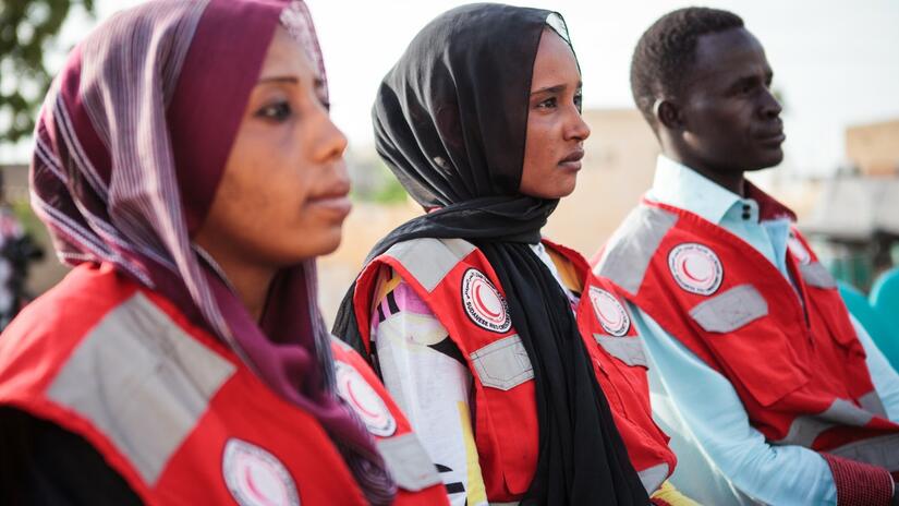 Sudanese Red Cross volunteers attend a volunteer meeting in White Nile state in July 2013
