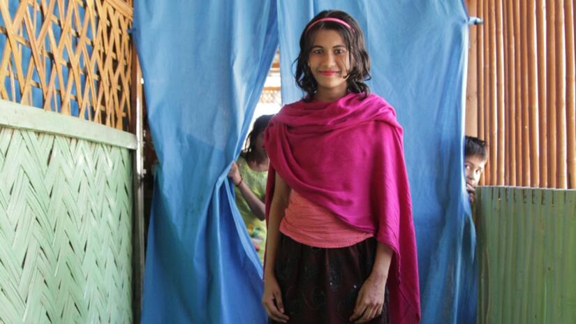 Assia from Rakhine, Myanmar, stands in a community safe space in Cox's Bazar run by the Bangladesh Red Crescent Society with support from the Danish Red Cross in January 2018.