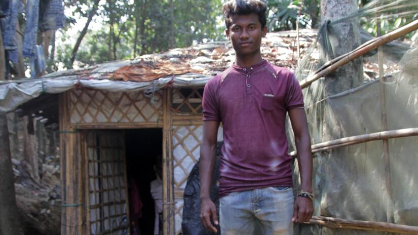 Tares, a 17 year old boy from Myanmar stands in Burmapara camp, Cox's Bazar in January 2018.