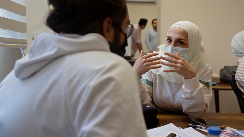 Alaa and Farouk, two participants of the ESSN storytelling project, take part in a communications skills workshop and talk in depth about their preferred methods of storytelling