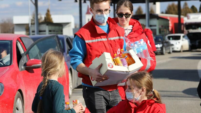 Red Cross Societies from countries bordering Ukraine have deployed volunteers to the border to provide food, water, basic aid items, hygiene products and health services to people fleeing conflict